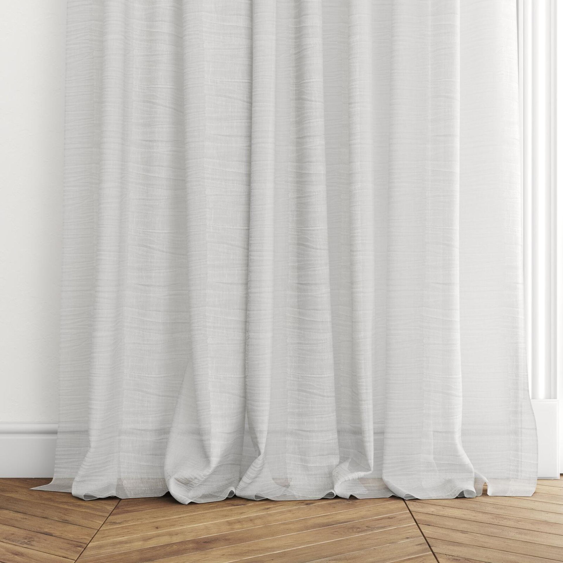 Bottom view of Impression Vapour, puddled with pinch pleat, on curtain rod
