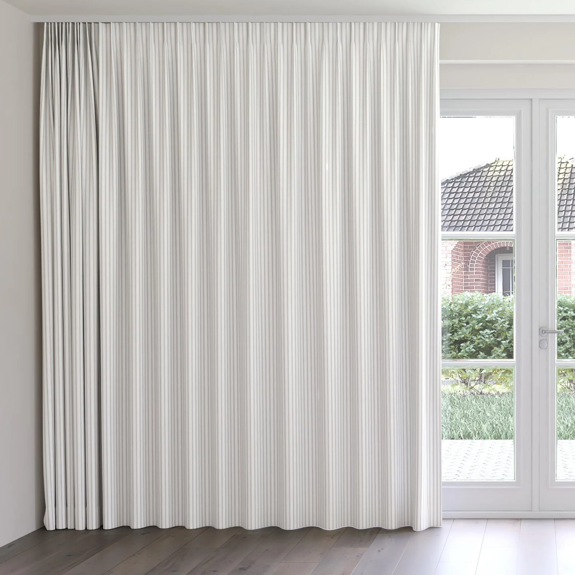Front view of Chambray Ticking Denim, on curtain rail