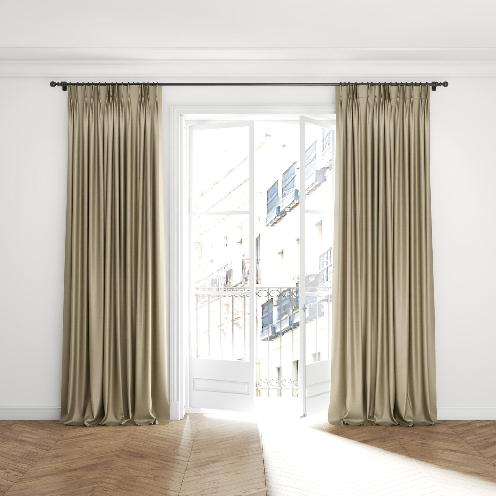 Full view of Silky Sponge, puddled with pinch pleat, on curtain rod