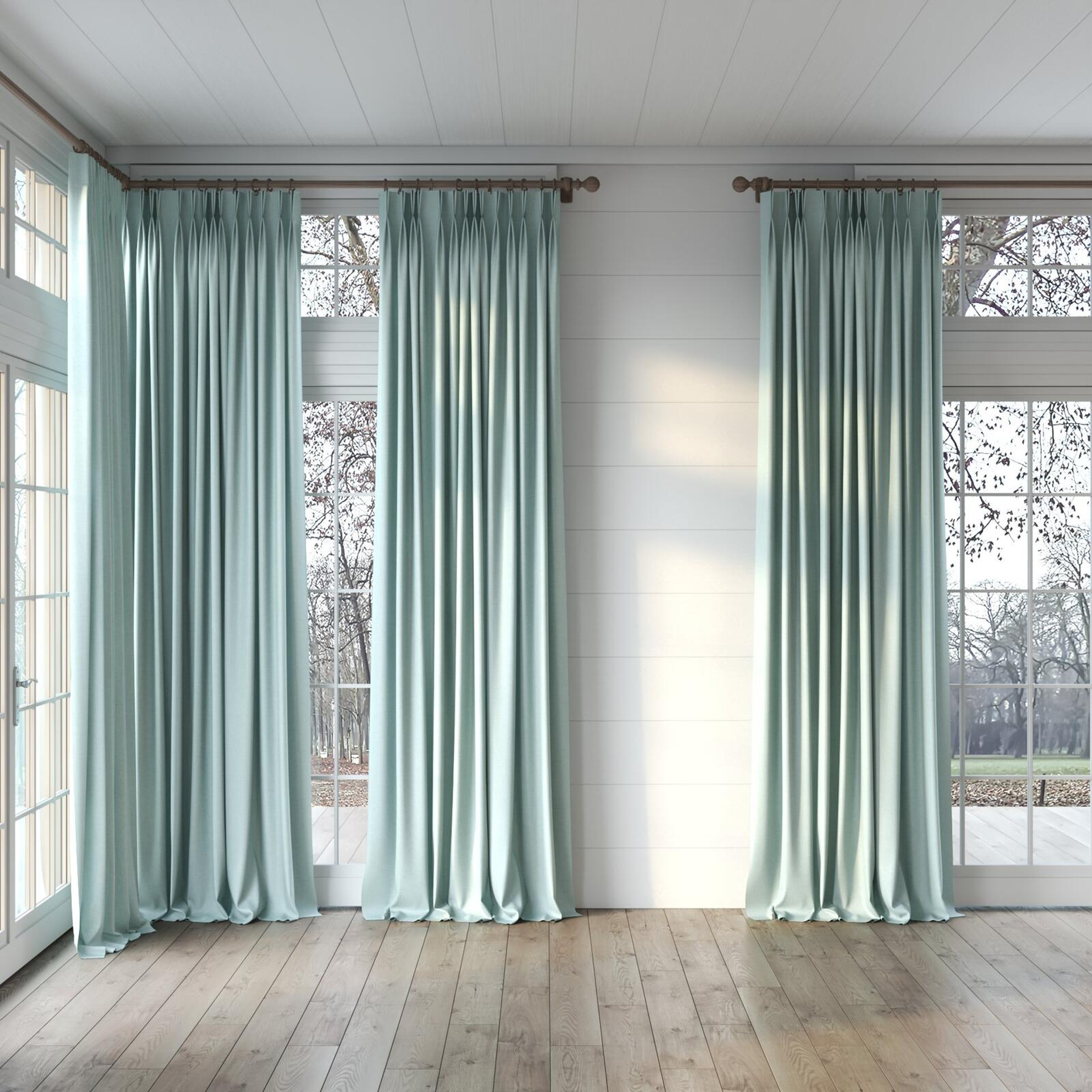 Full view of Cushy Sky, puddled, on curtain rod