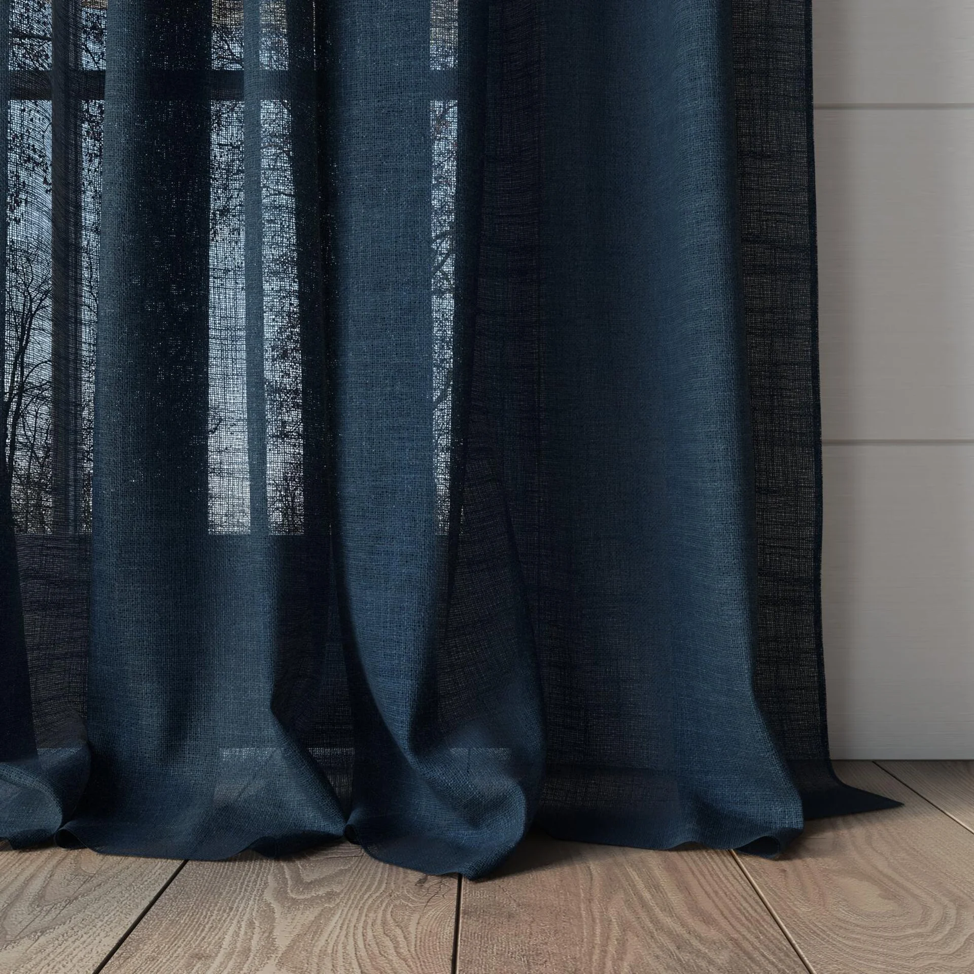 Bottom view of Verdant Navy, puddled, on curtain rod