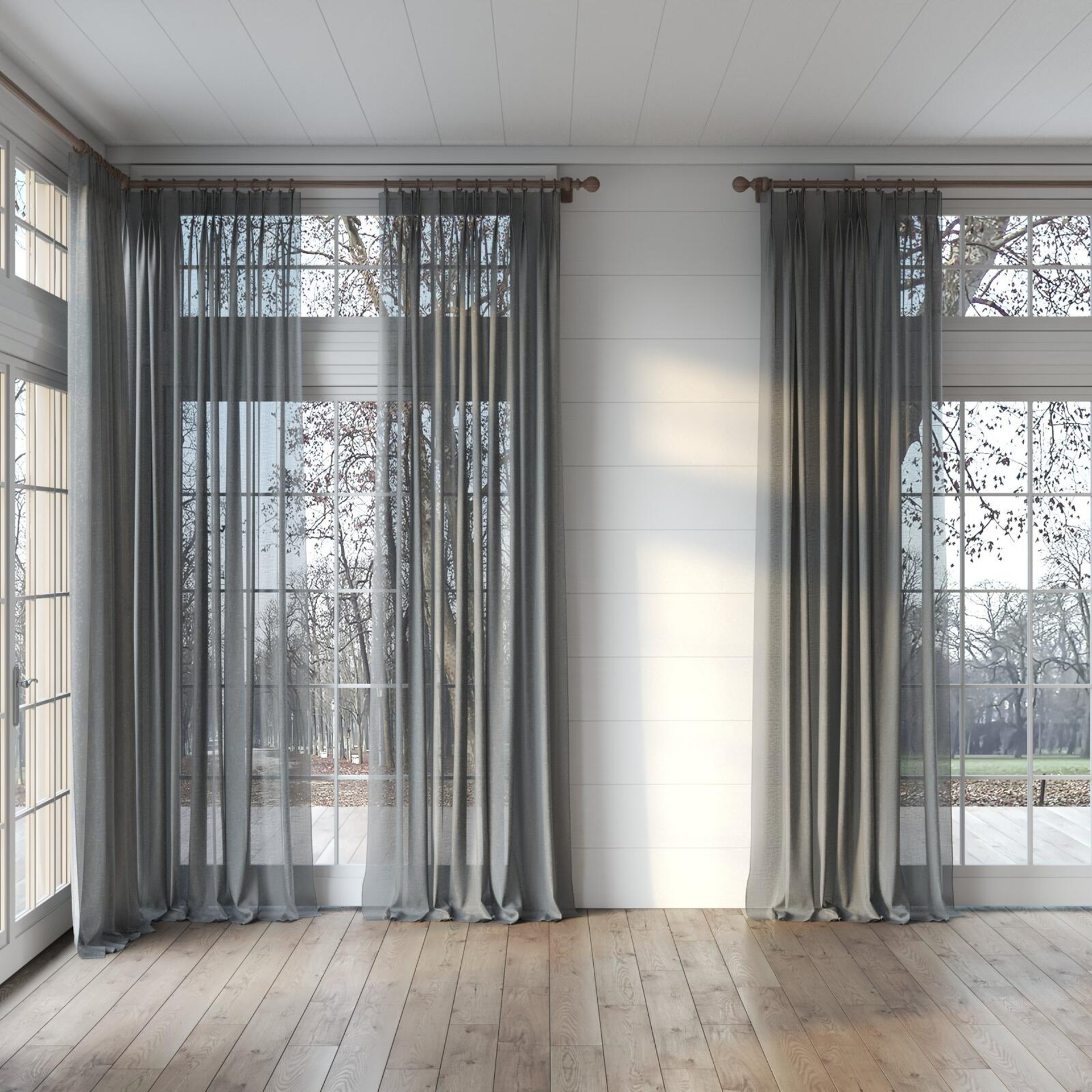 Full view of Uno Shadow, puddled, on curtain rod