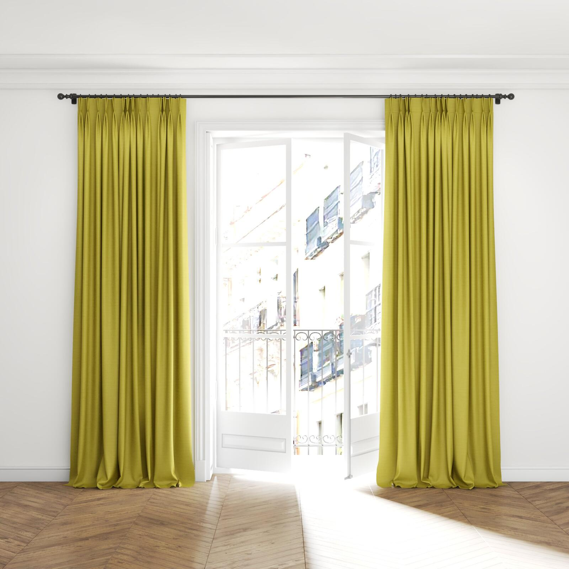 Full view of Linex Chartreuse, puddled with pinch pleat, on curtain rod