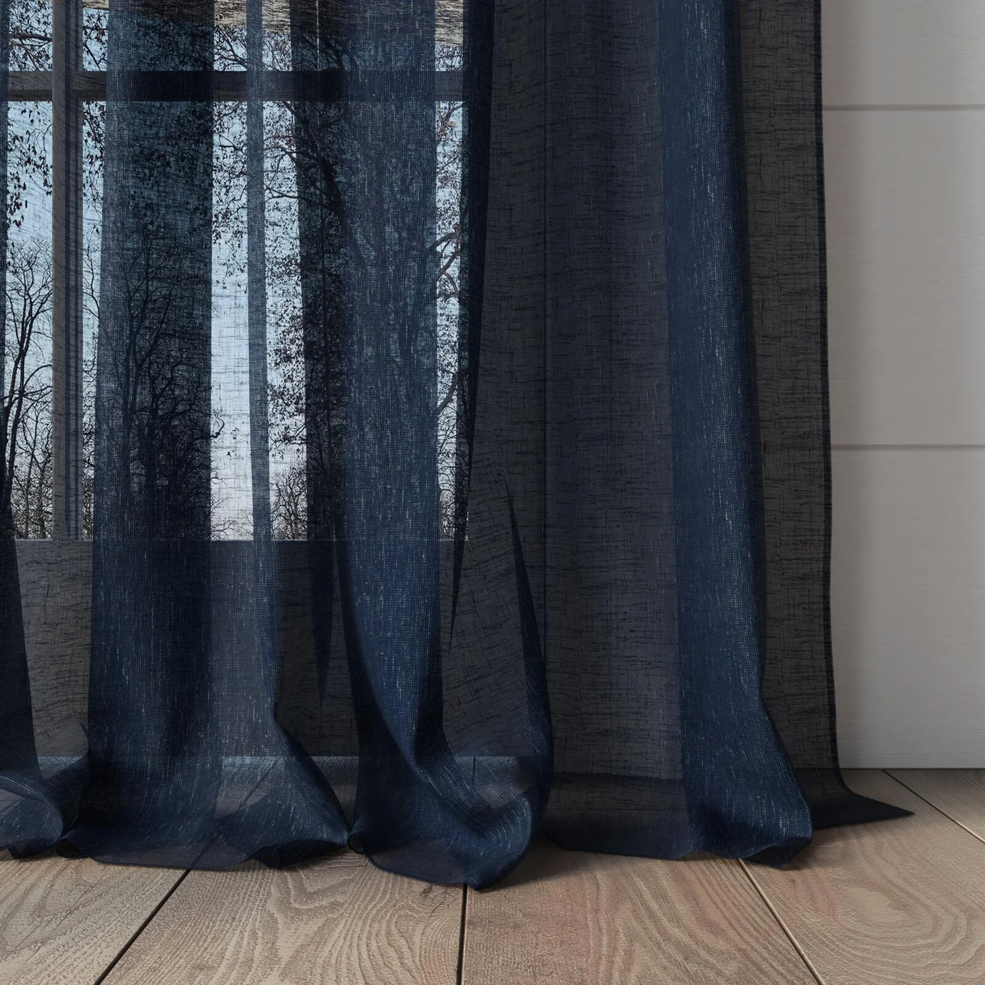 Bottom view of Graceful Navy, puddled, on curtain rod