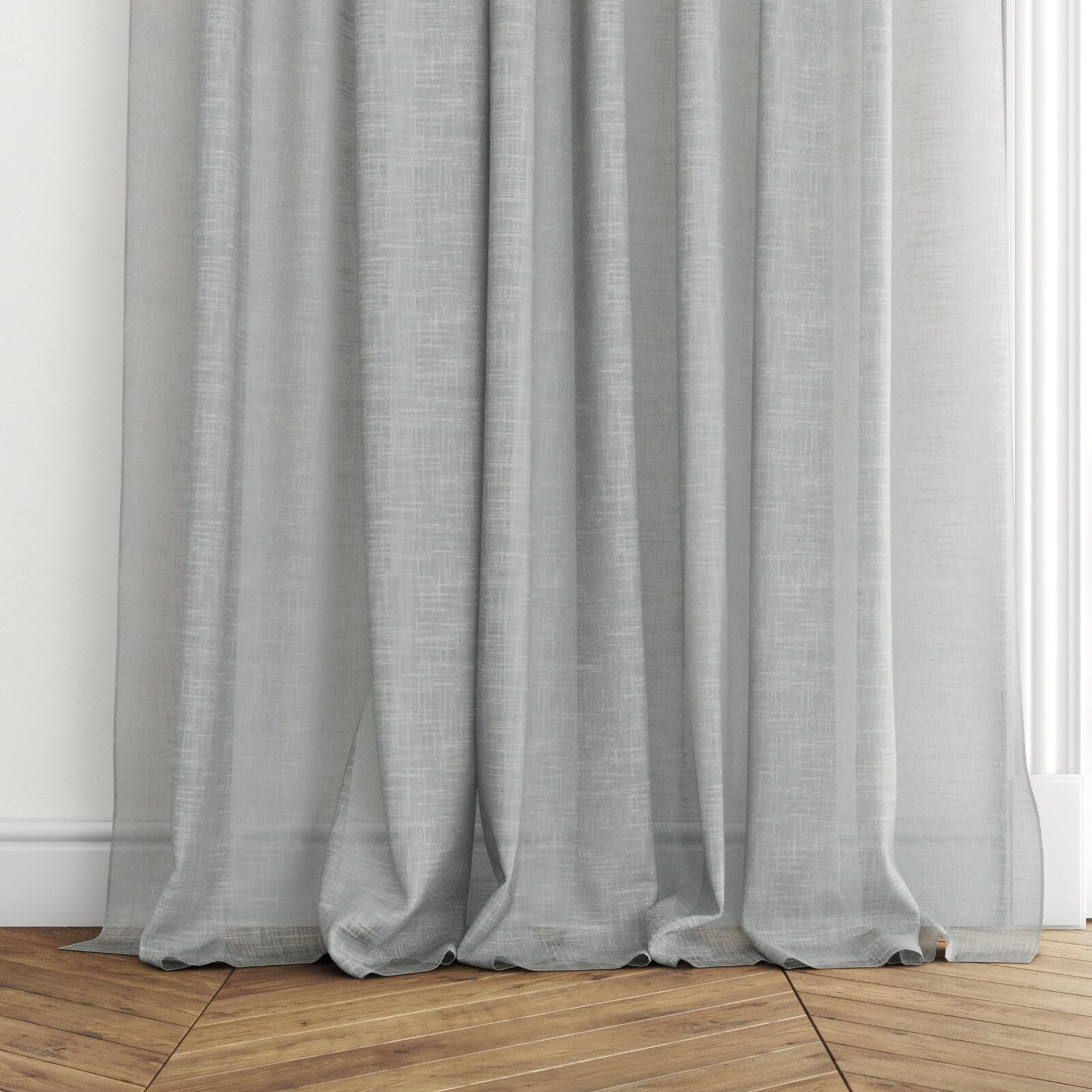 Bottom view of Savina Smoke, puddled with pinch pleat, on curtain rod