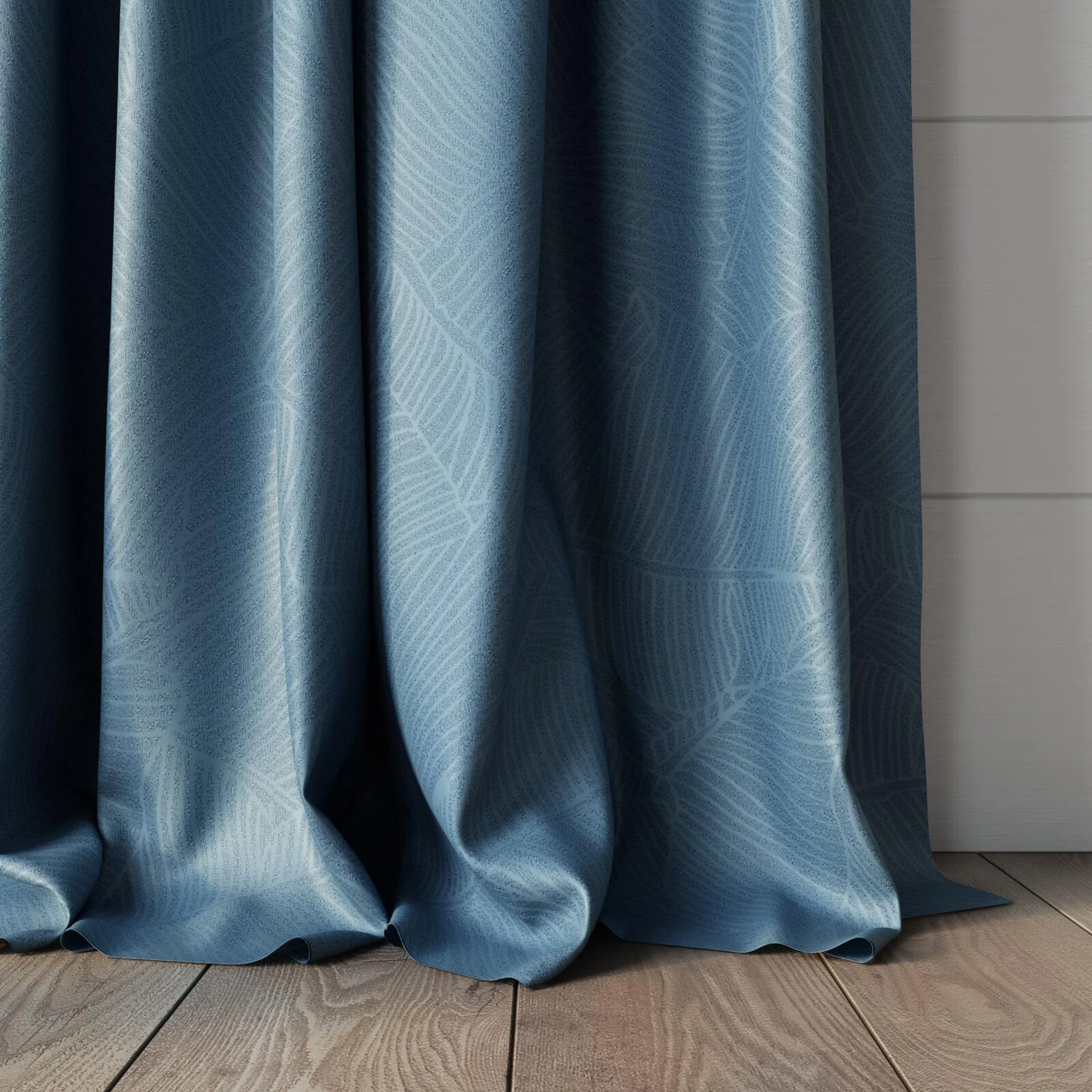 Bottom view of Umbra Denim, puddled, on curtain rod