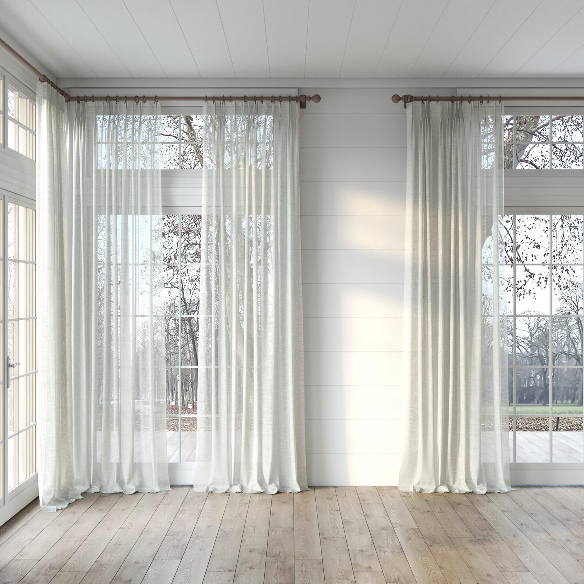 Full view of Savina Sand, puddled, on curtain rod
