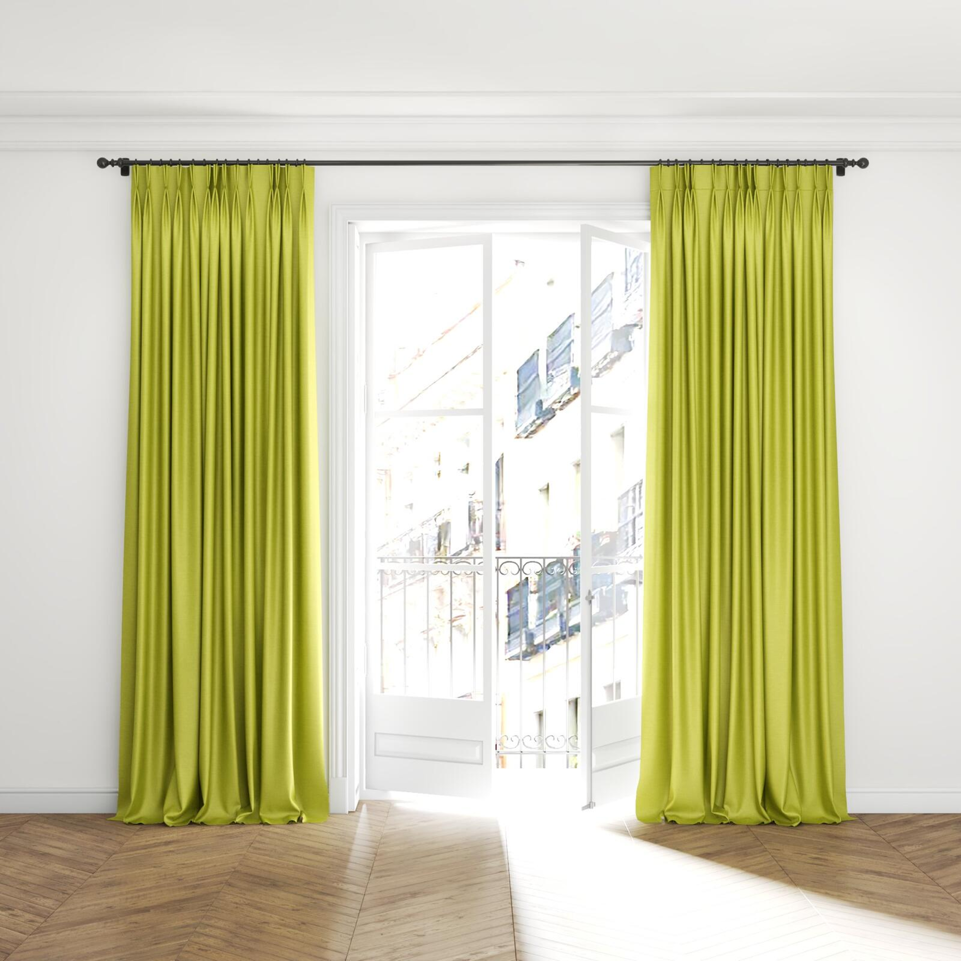 Full view of Provence Chartreuse, puddled with pinch pleat, on curtain rod
