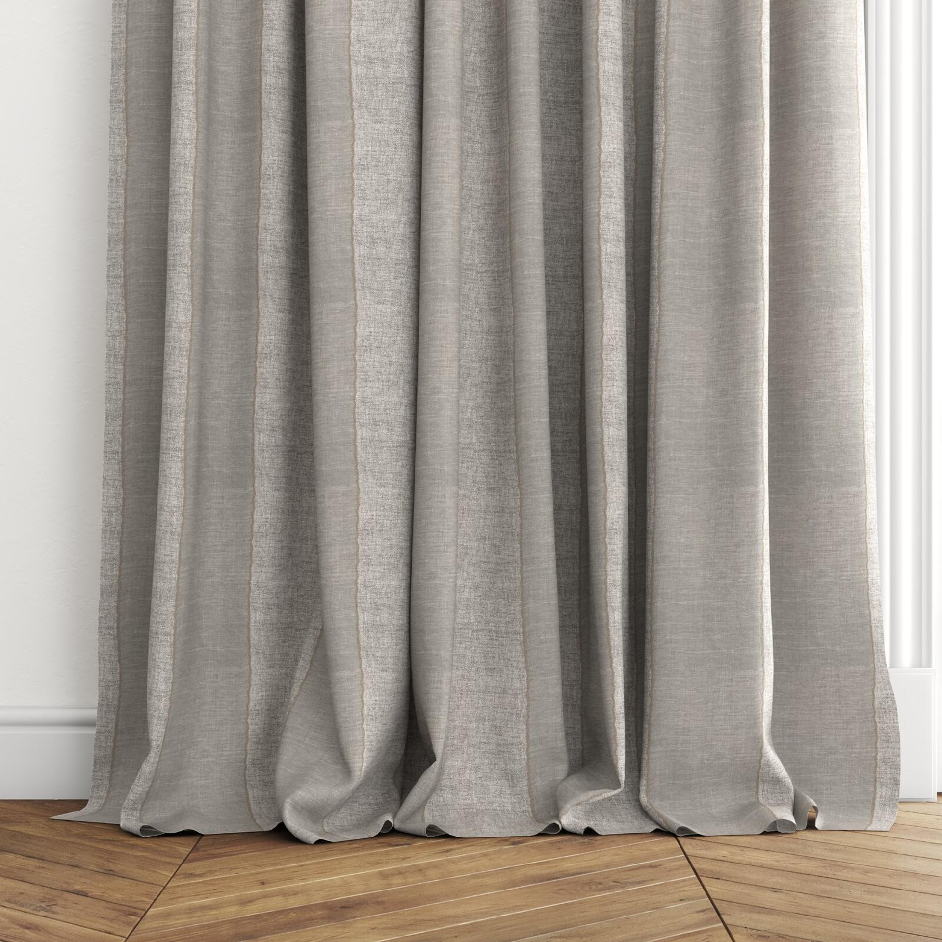 Bottom view of Zanella Night, puddled with pinch pleat, on curtain rod