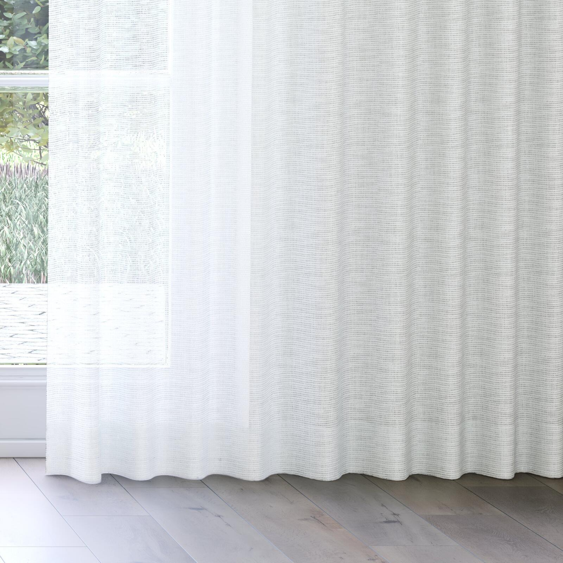 Bottom view of Threaded Wool, on curtain rail
