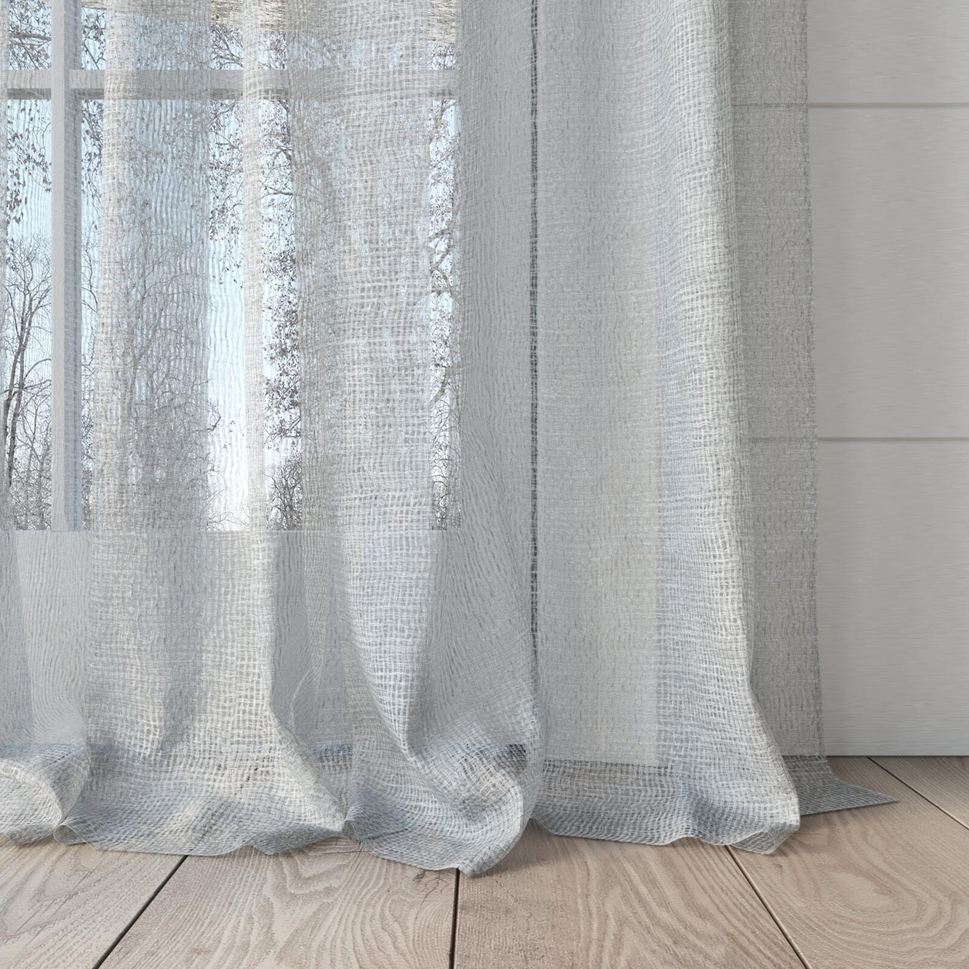 Bottom view of Kensho Silver, puddled, on curtain rod