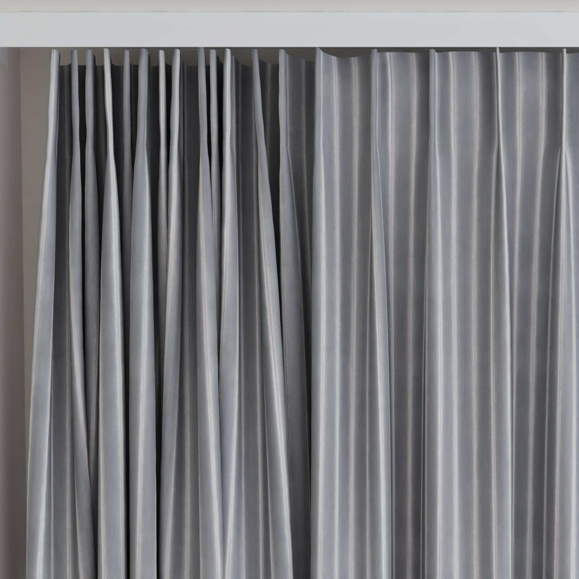Top view of Cordial Mouse, on curtain rail