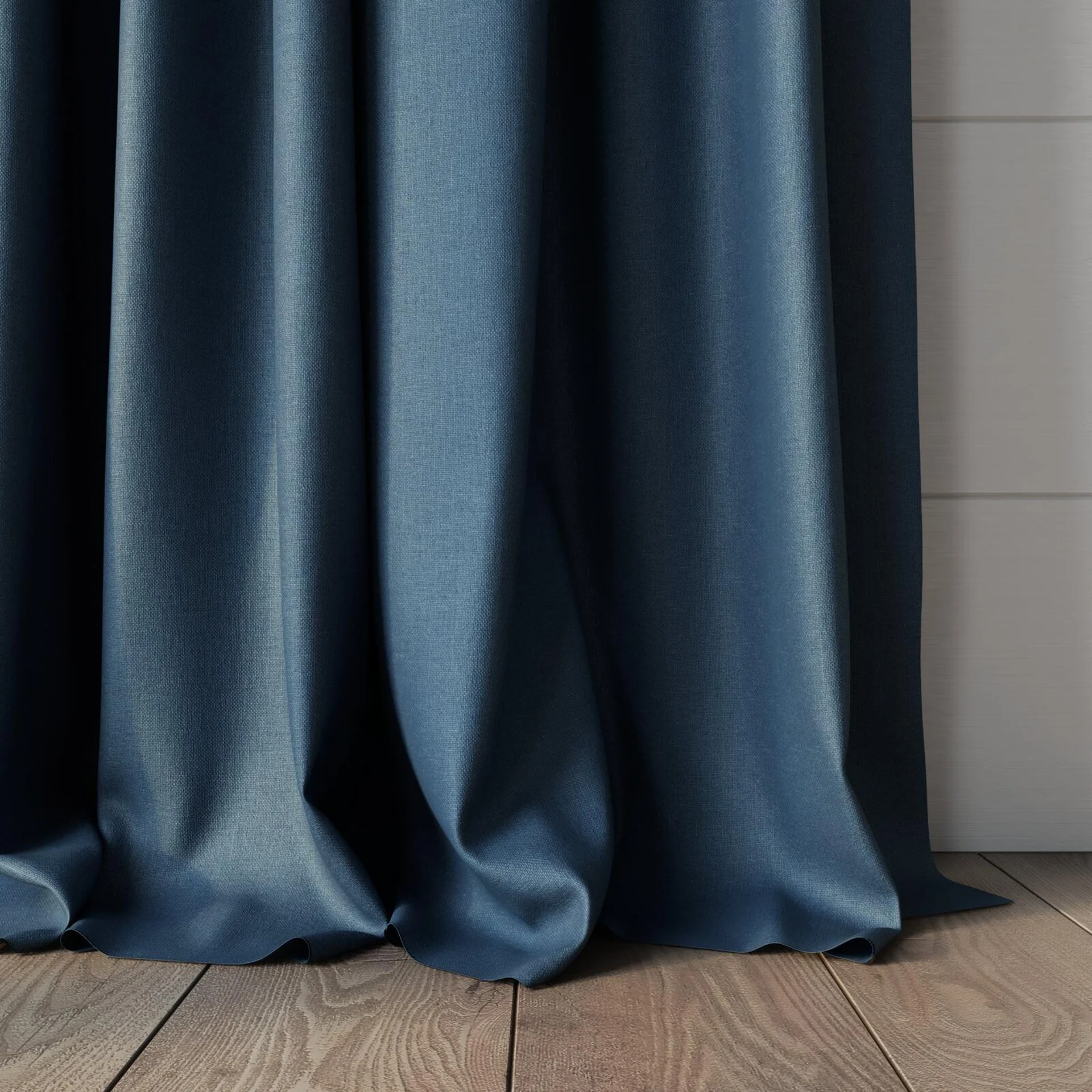 Bottom view of Kanvas Denim, puddled, on curtain rod