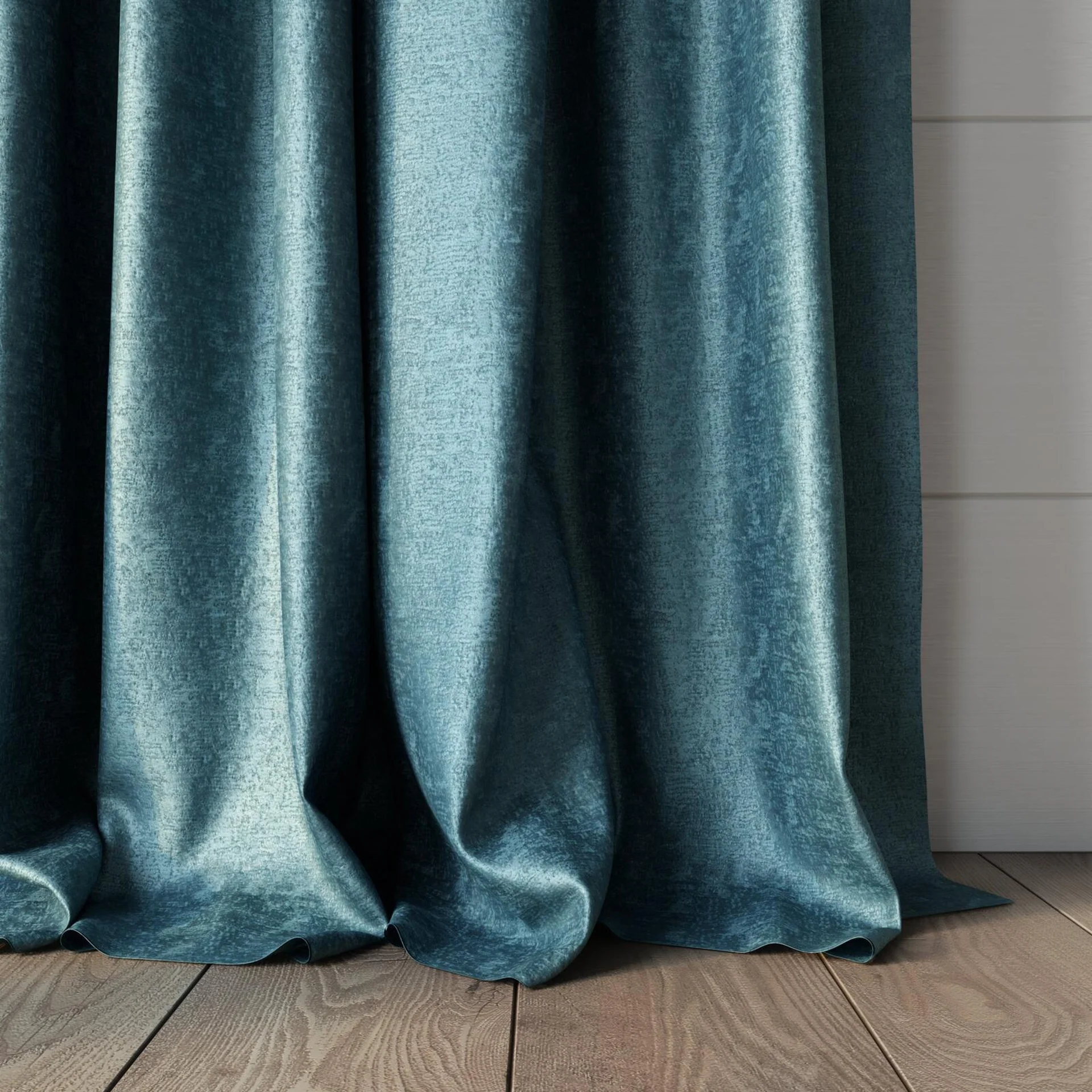 Bottom view of Hug Teal, puddled, on curtain rod