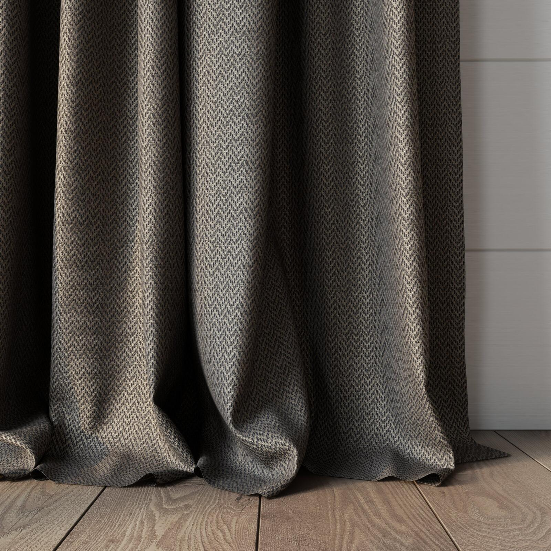 Bottom view of Iconji Liquorice, puddled, on curtain rod