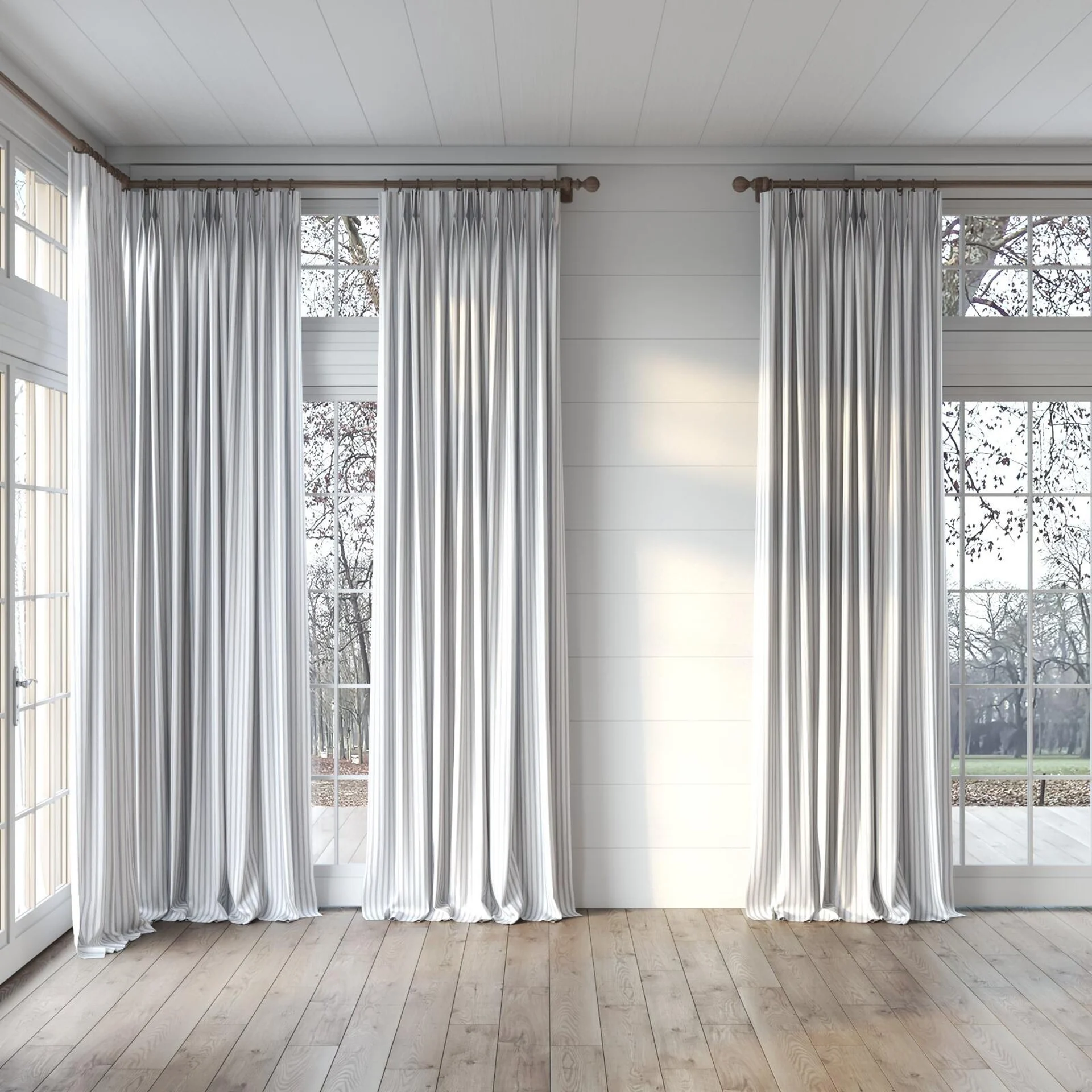 Full view of Chambray Ticking Black, puddled, on curtain rod