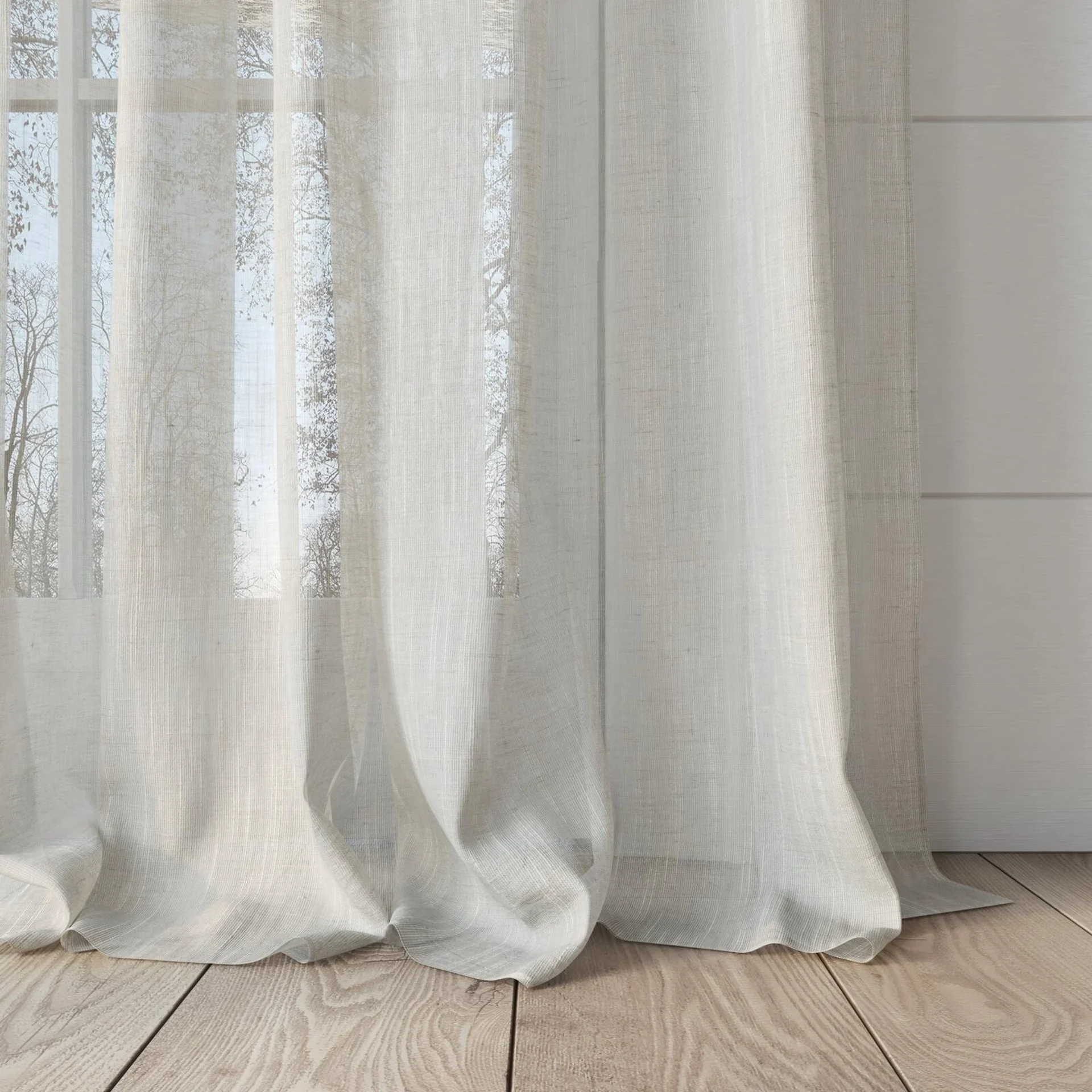 Bottom view of Rhythm Linen, puddled, on curtain rod