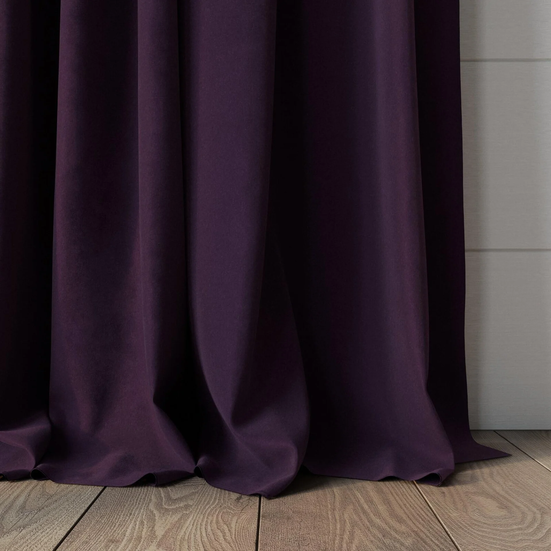 Bottom view of Lux Velvet Aubergine 8612, puddled, on curtain rod