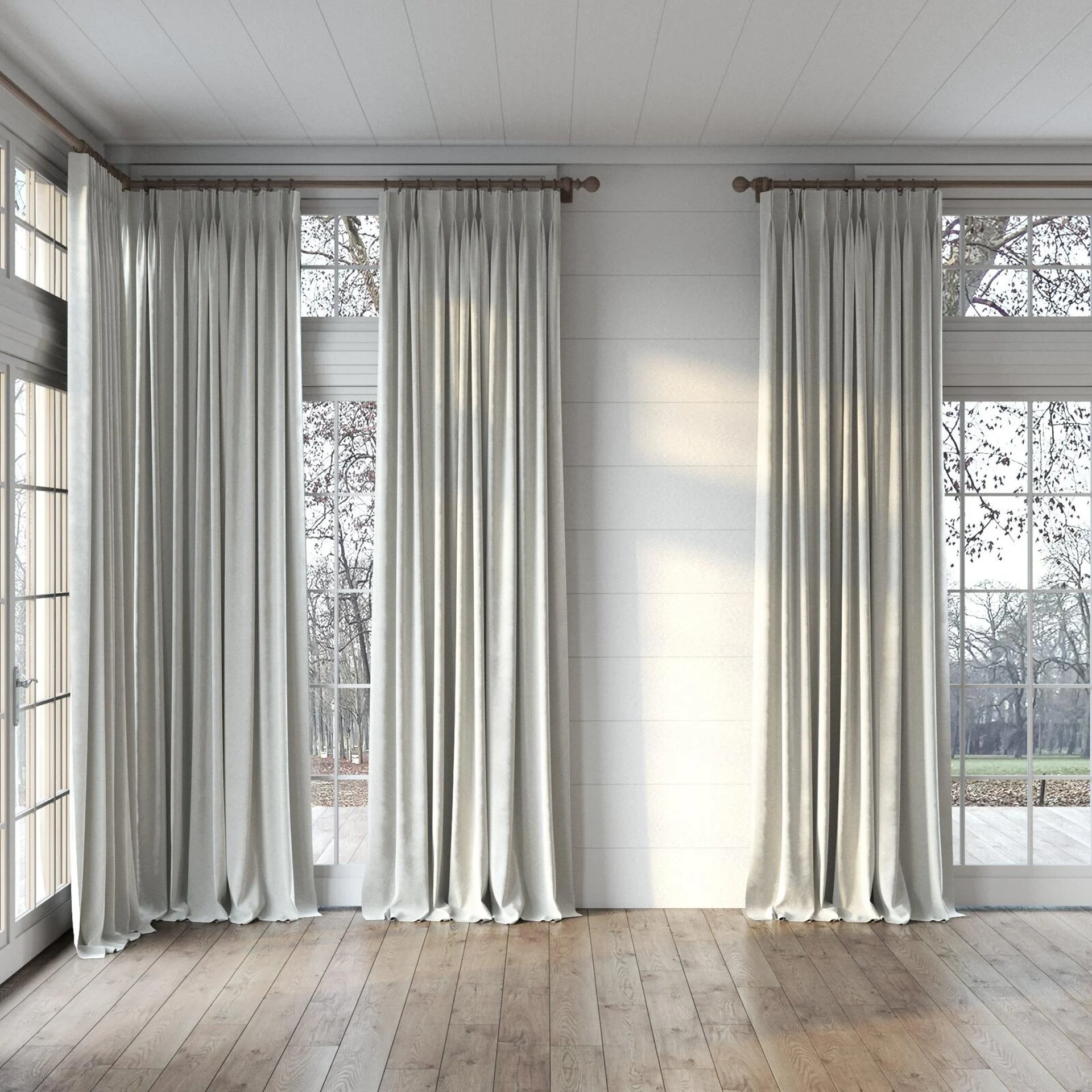 Full view of Velvelux Sterling, puddled, on curtain rod