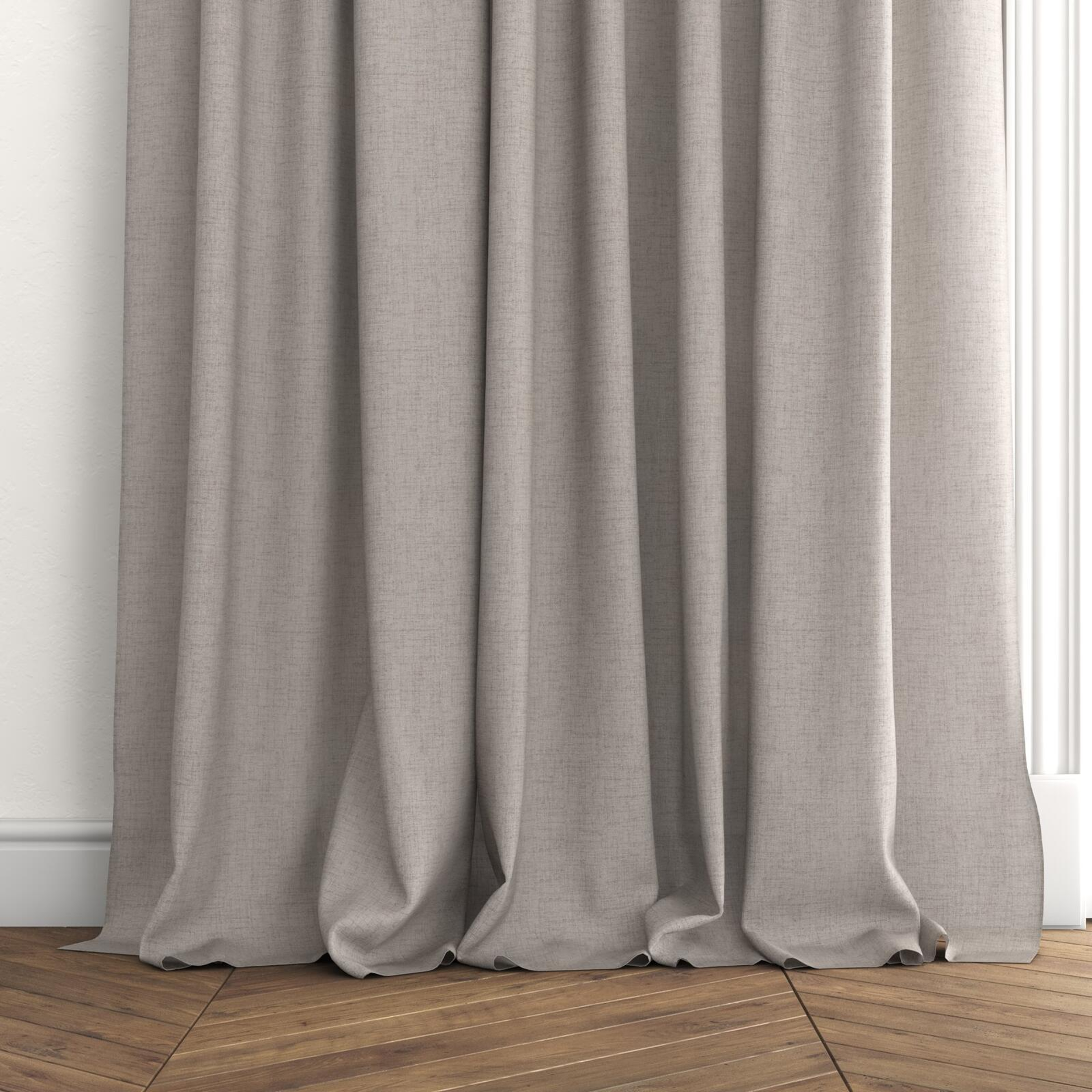 Bottom view of Rava Quartz, puddled with pinch pleat, on curtain rod