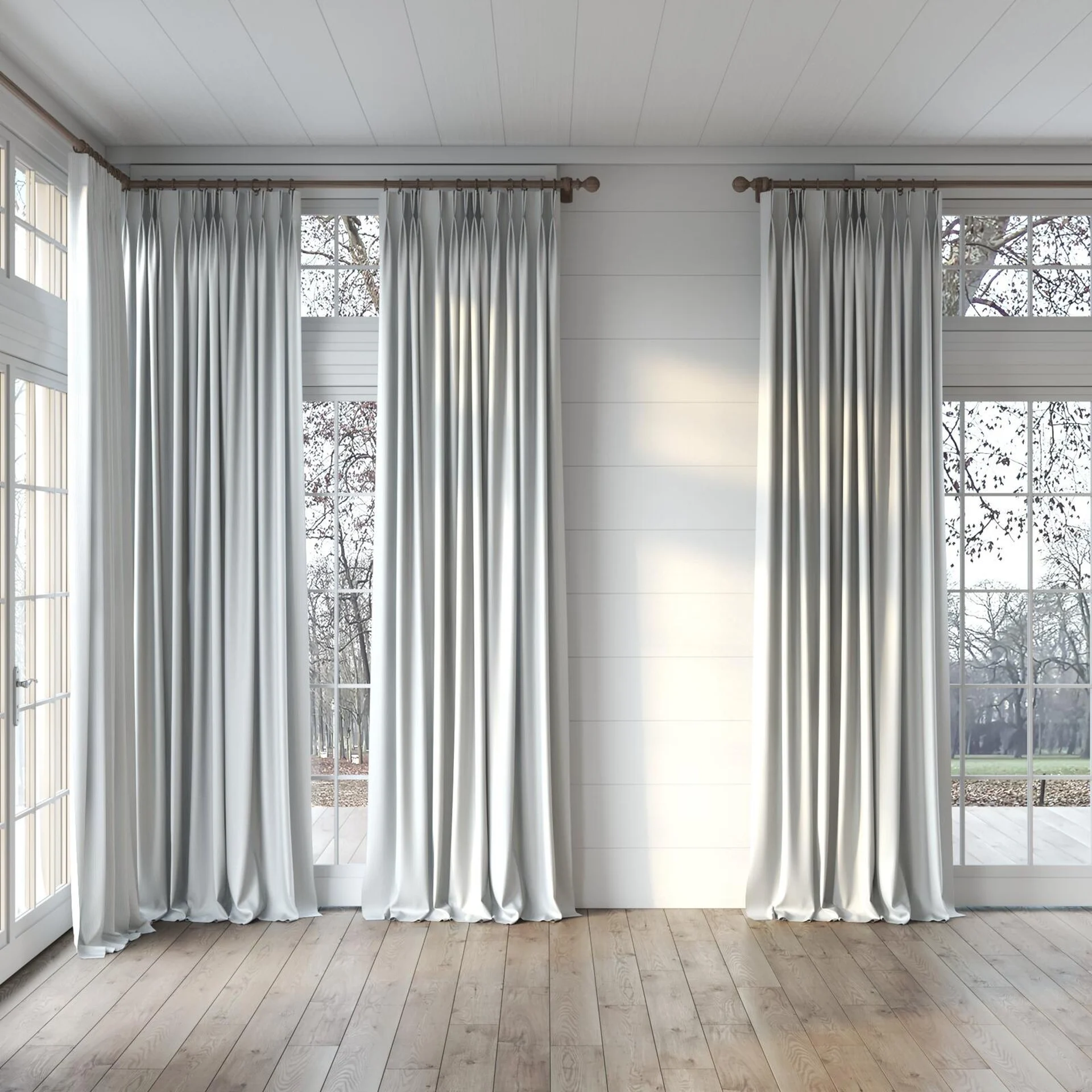 Full view of Sinuous Chrome, puddled, on curtain rod