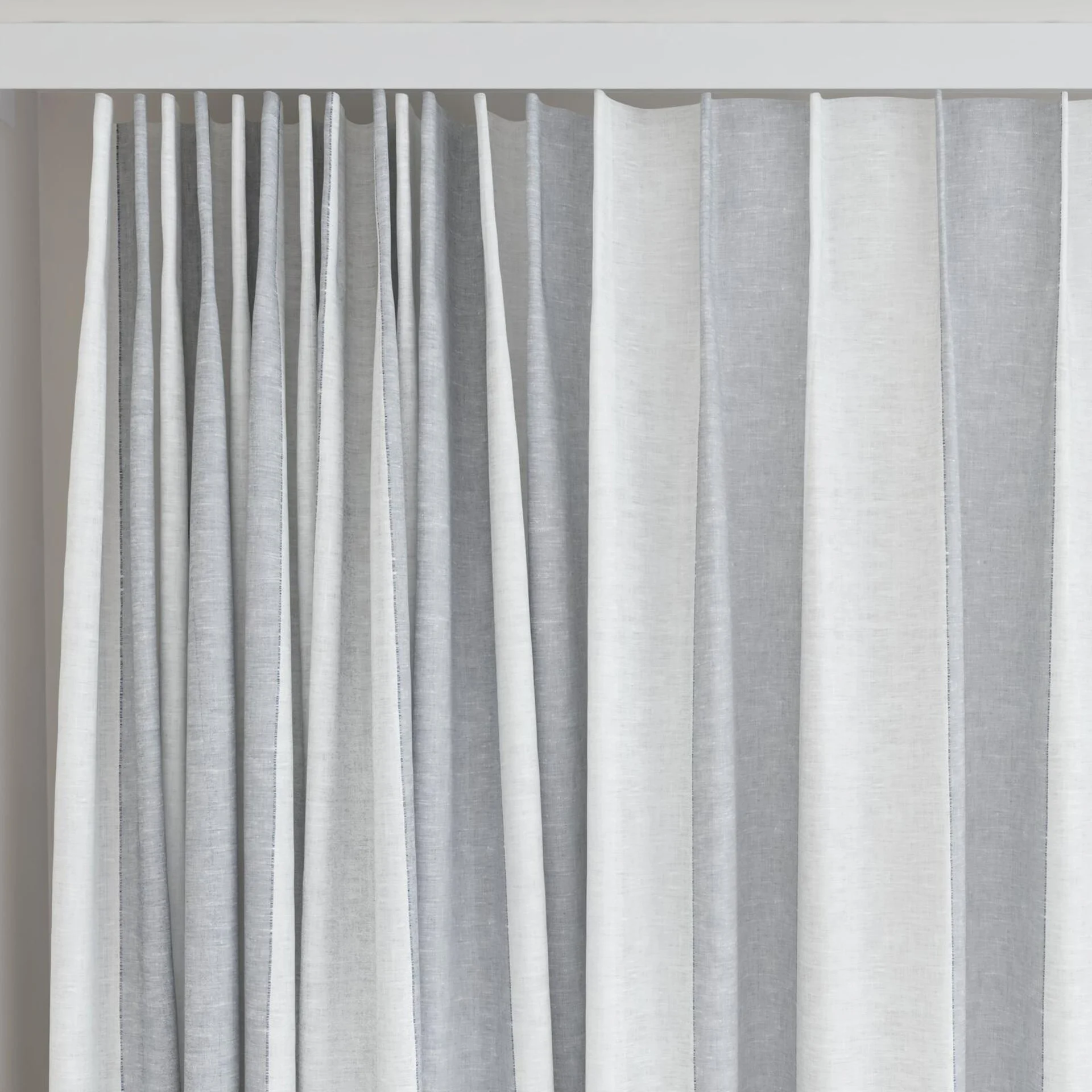 Top view of Kyoto Stripe Chambray, on curtain rail