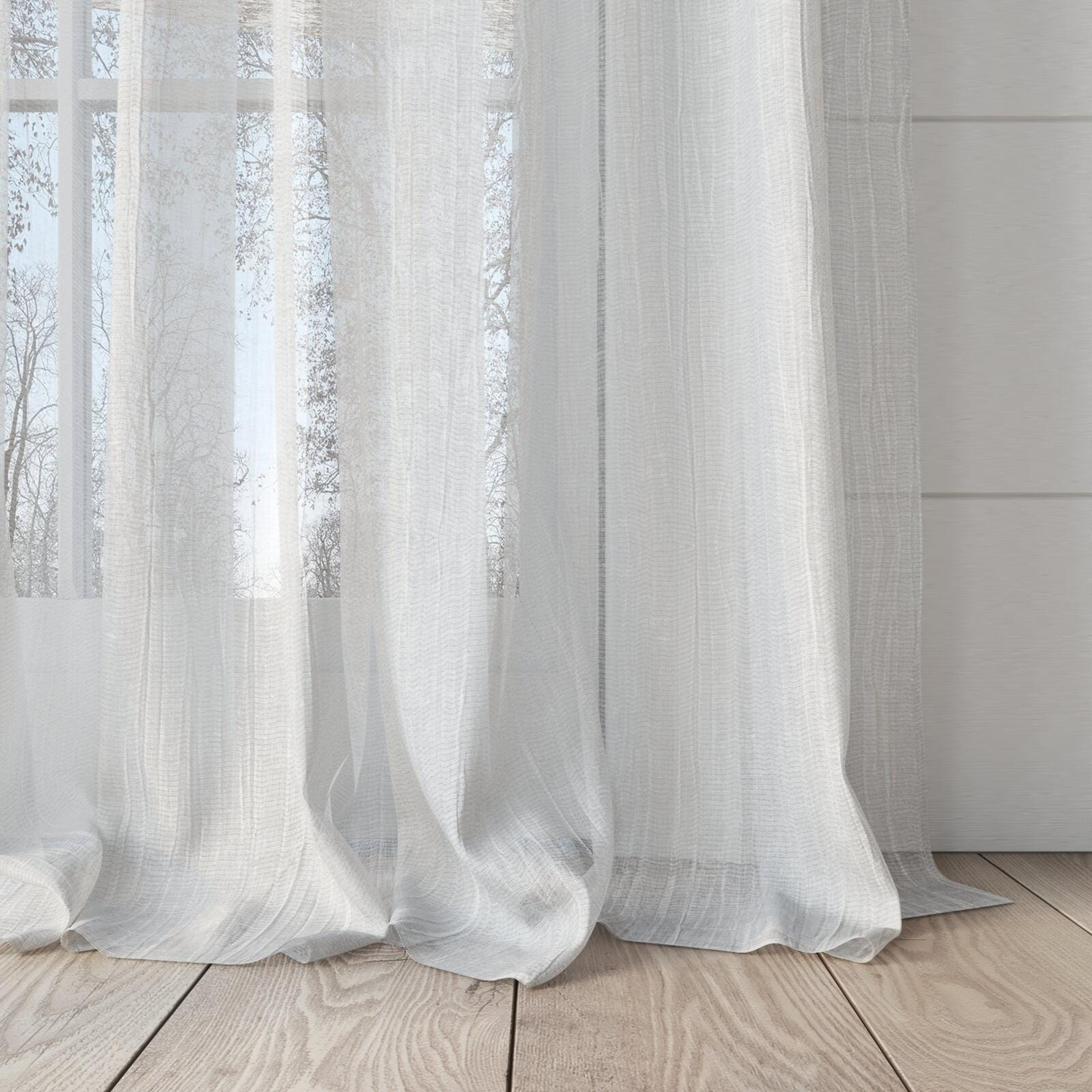 Bottom view of Sonata Ice, puddled, on curtain rod