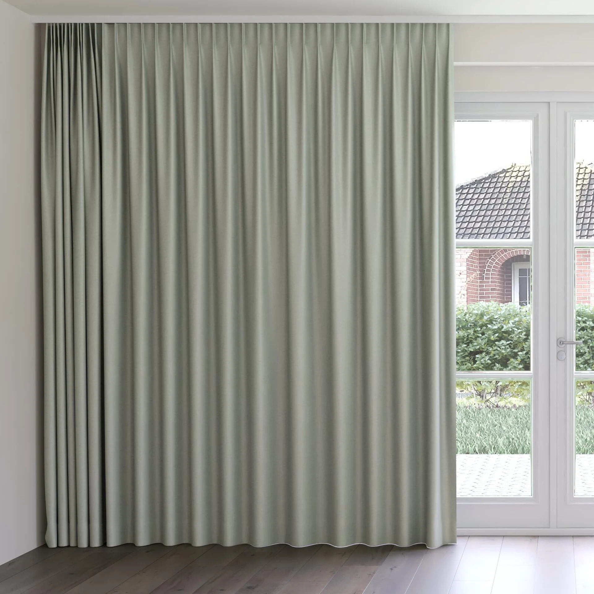 Front view of Eclipse Blackout Celadon, on curtain rail
