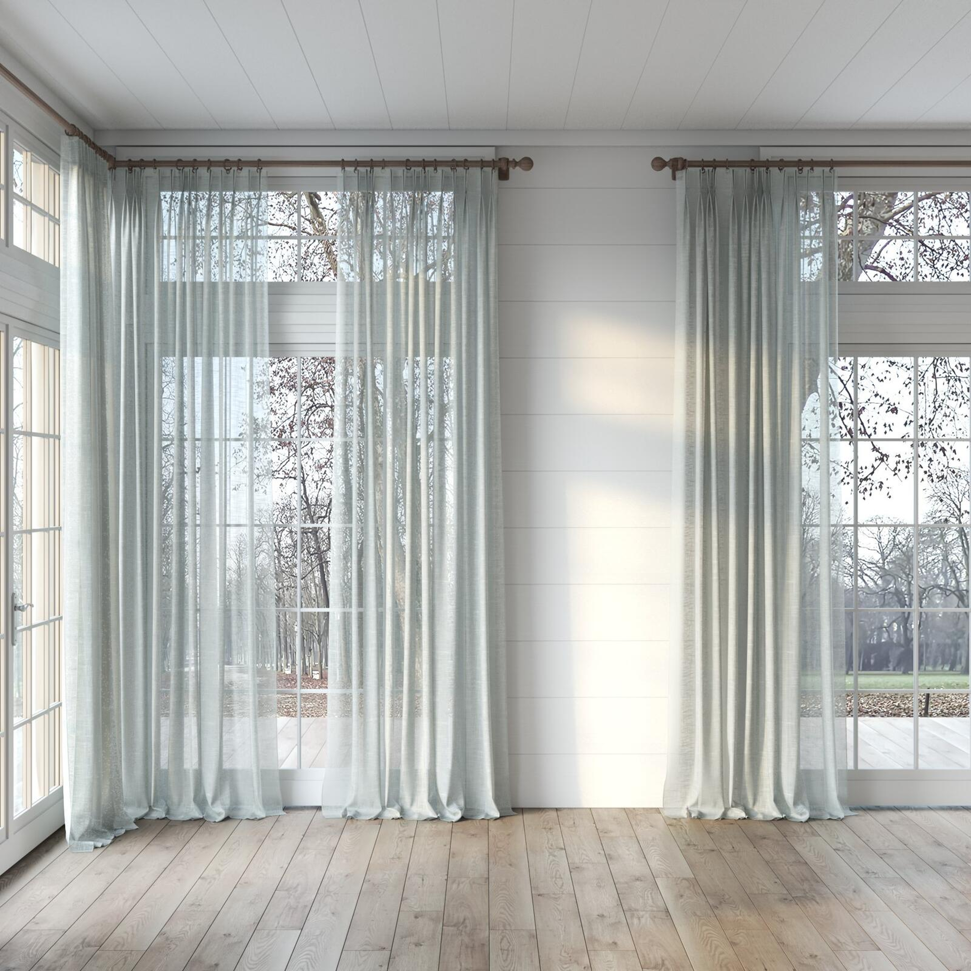 Full view of Savina Celadon, puddled, on curtain rod