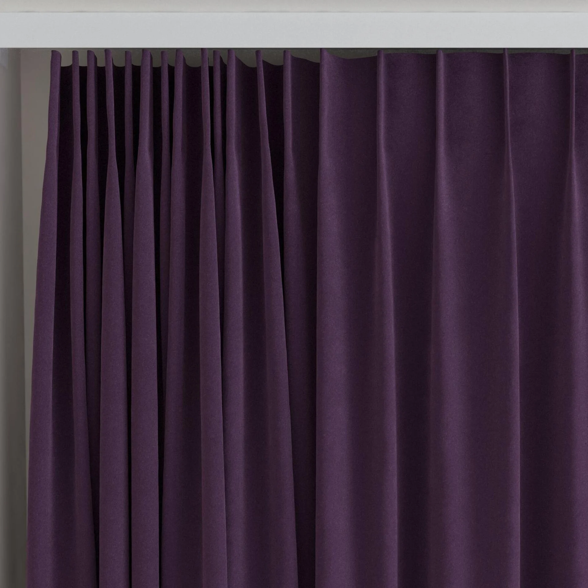 Top view of Lux Velvet Aubergine 8612, on curtain rail