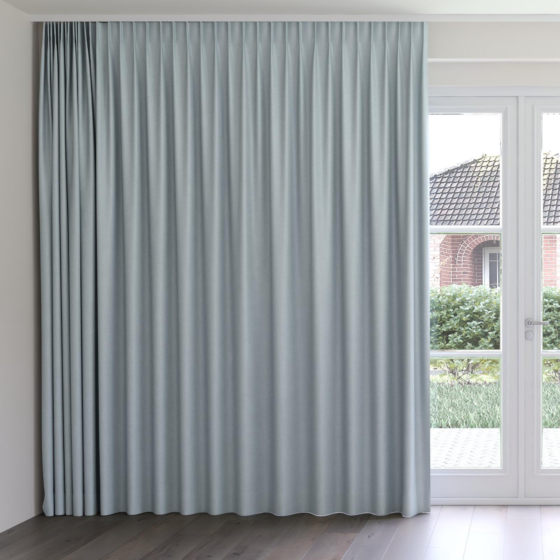 Front view of Cushy Aqua, on curtain rail