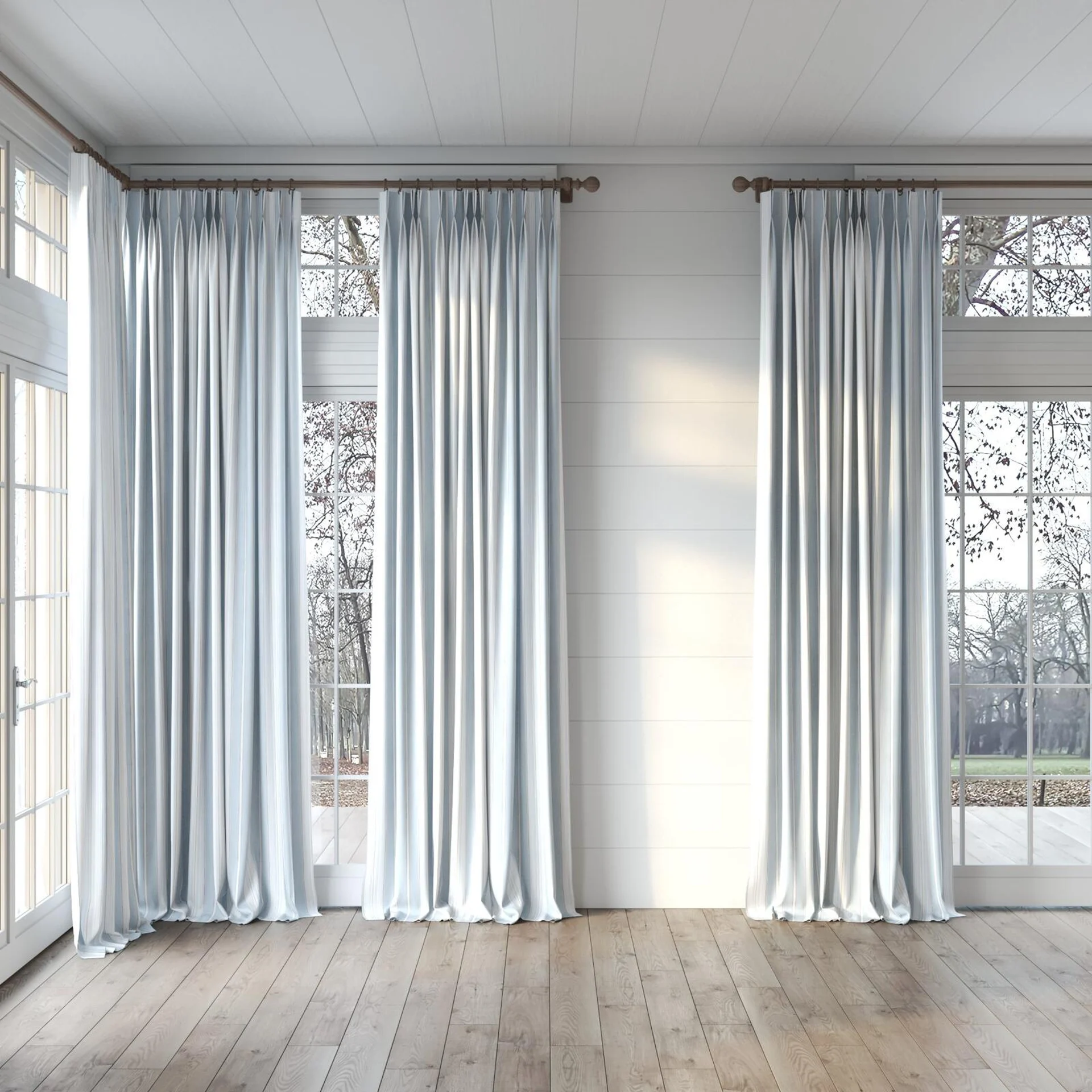 Full view of Chambray Multi Sky Blue, puddled, on curtain rod