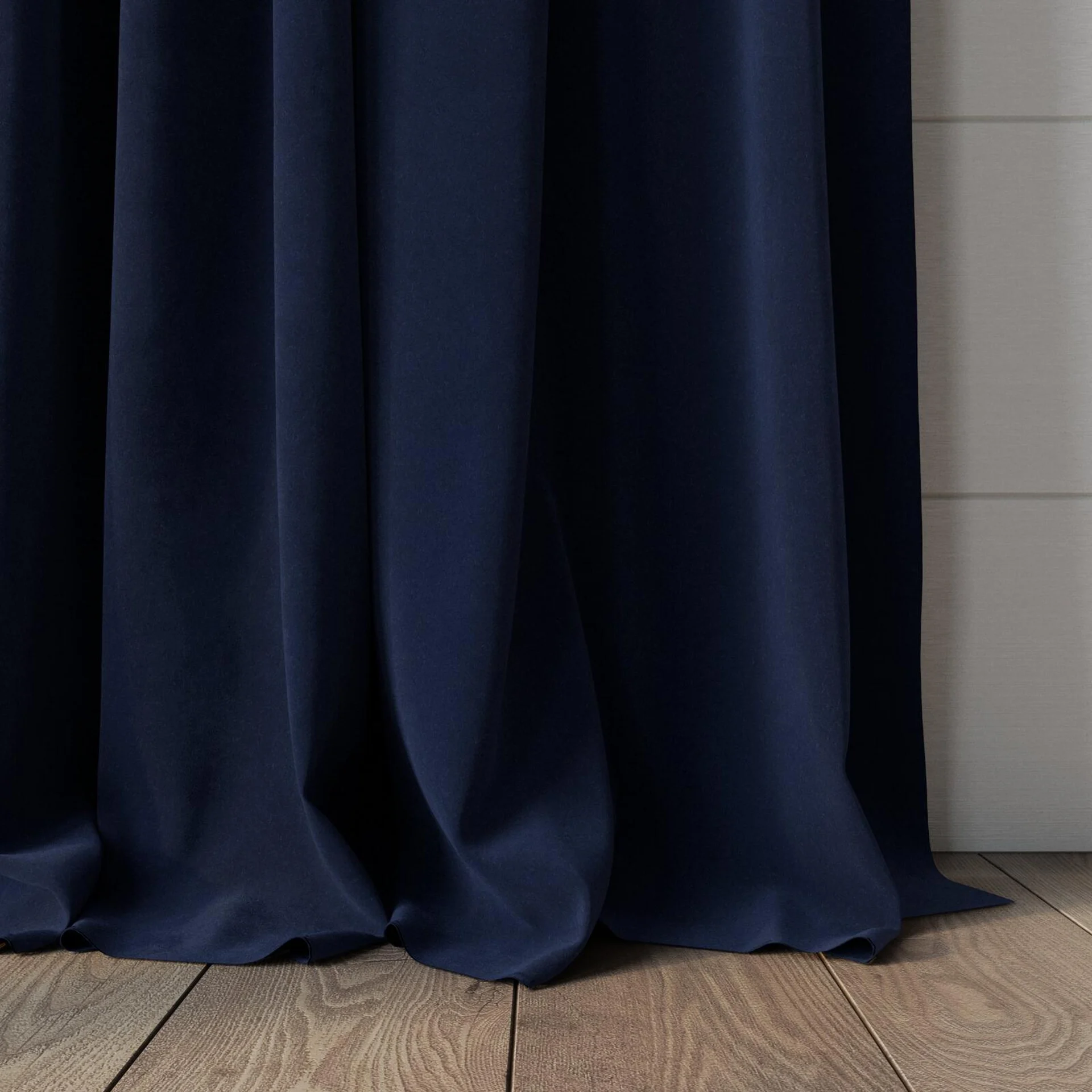 Bottom view of Lux Velvet Midnight 8818, puddled, on curtain rod