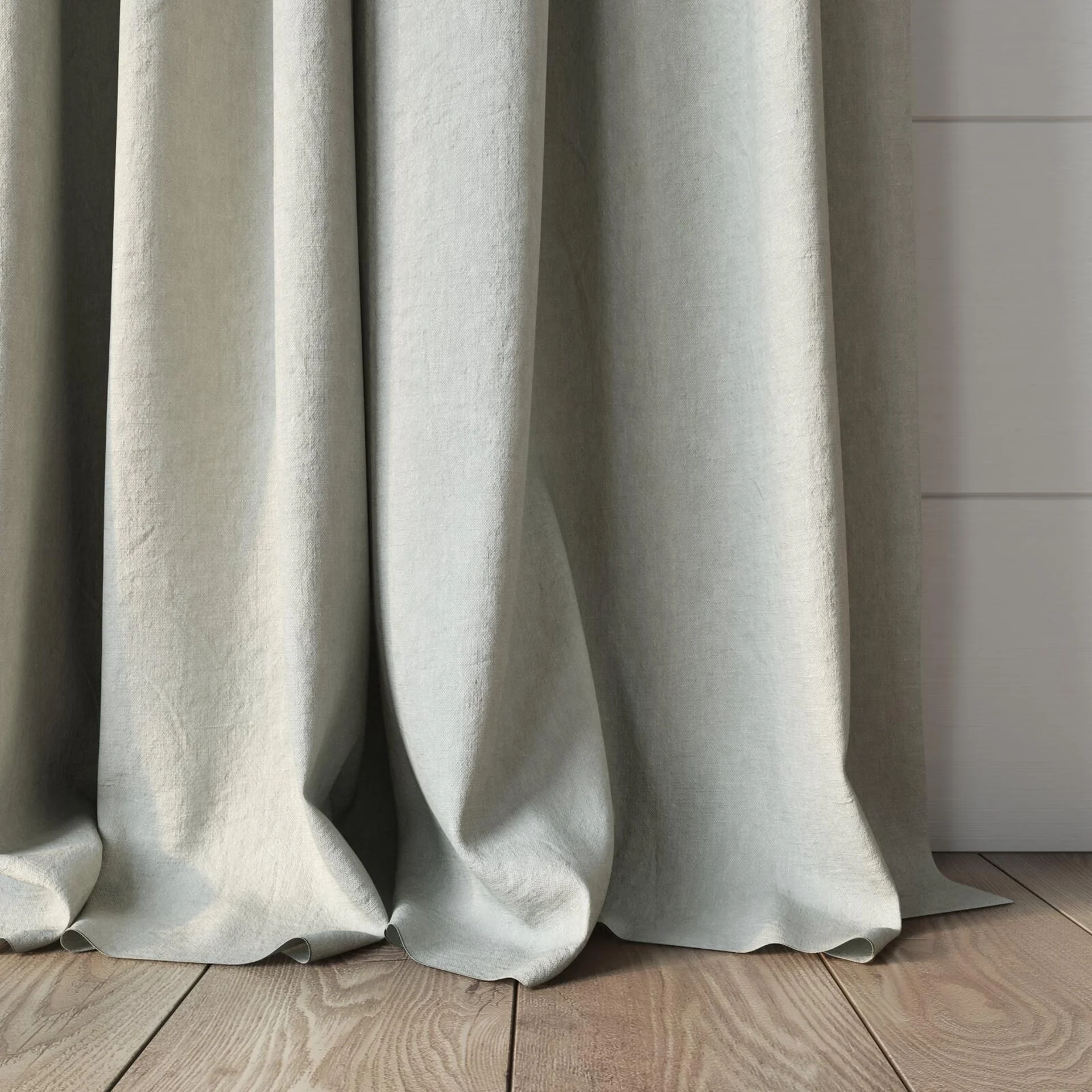 Bottom view of Obi Stonewash Willow, puddled, on curtain rod