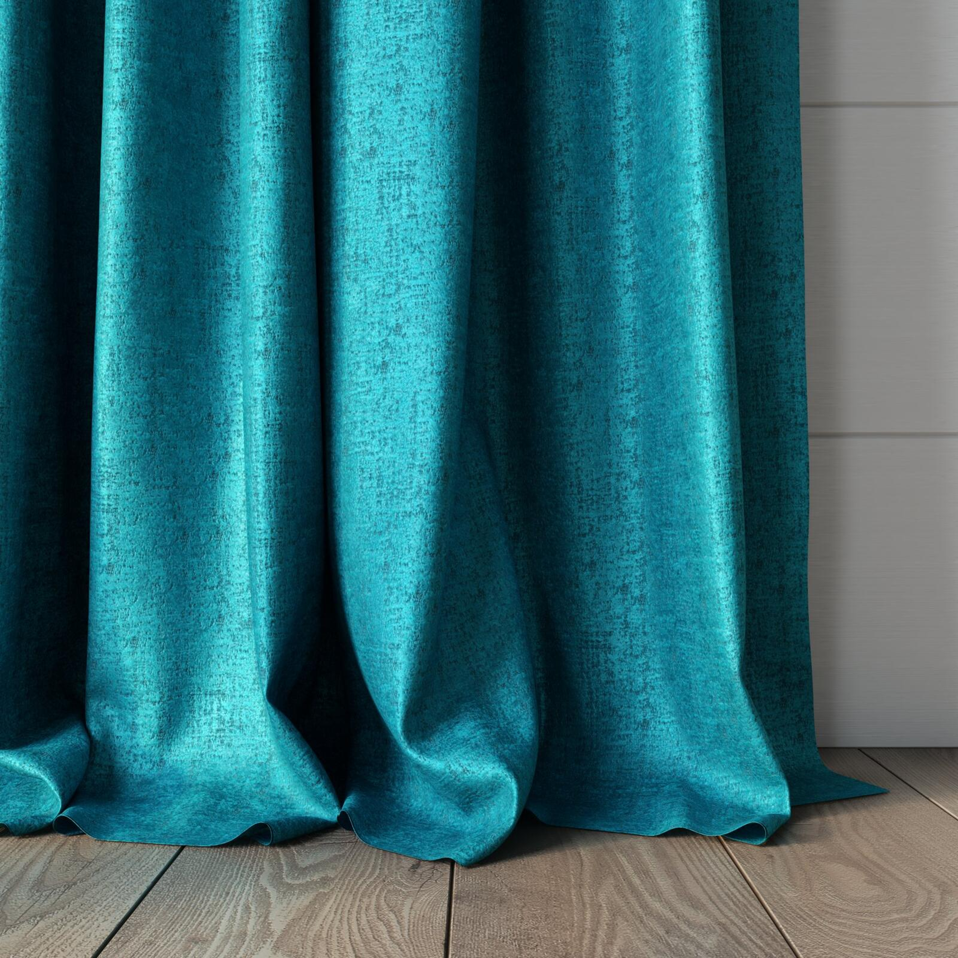 Bottom view of Hug Turquoize, puddled, on curtain rod