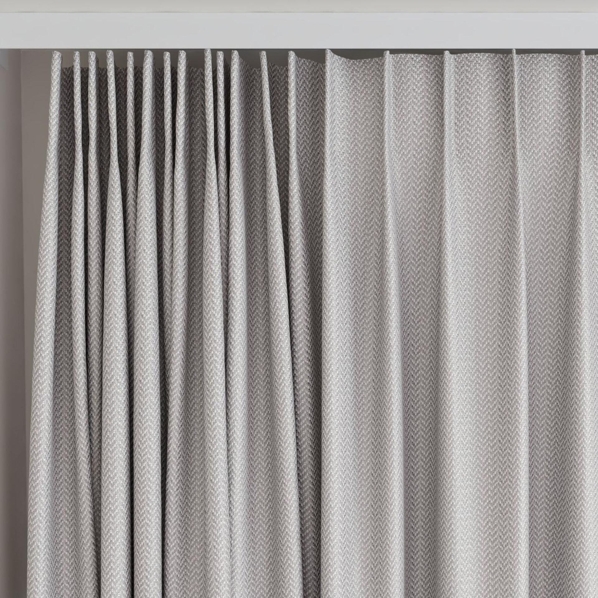 Top view of Iconji Silver, on curtain rail