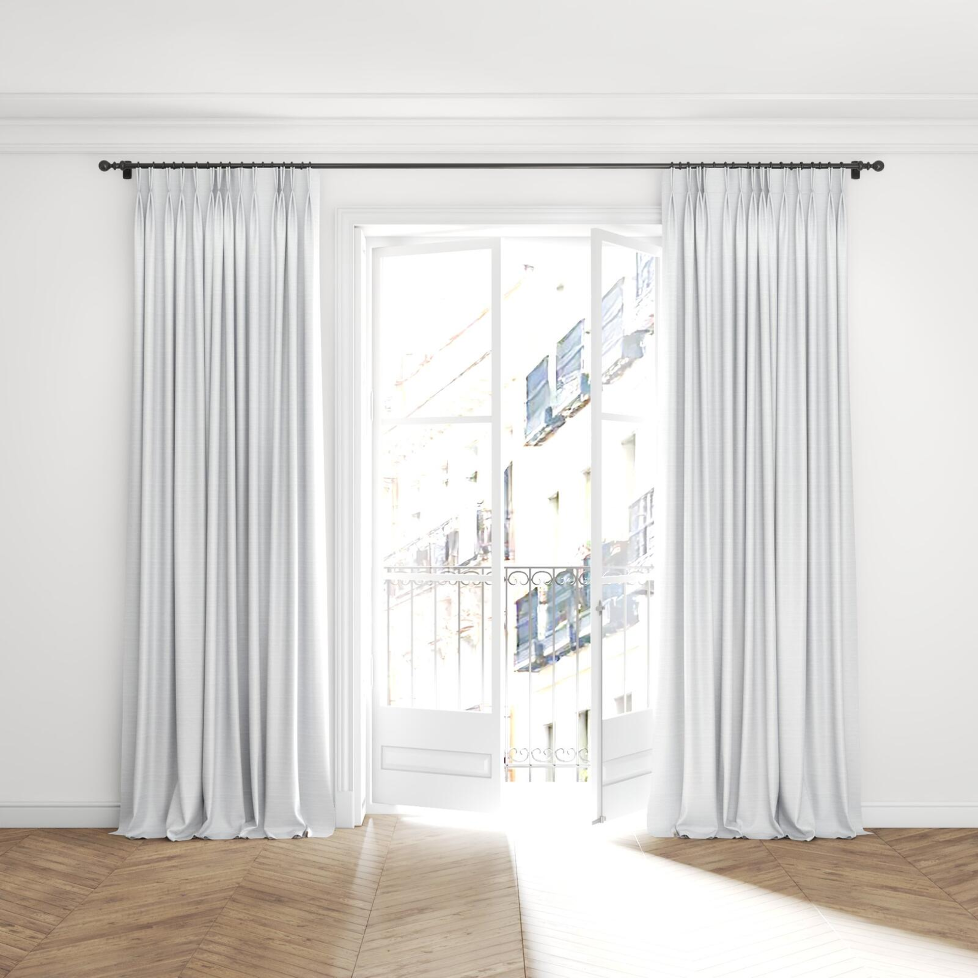 Full view of Silky Snow, puddled with pinch pleat, on curtain rod