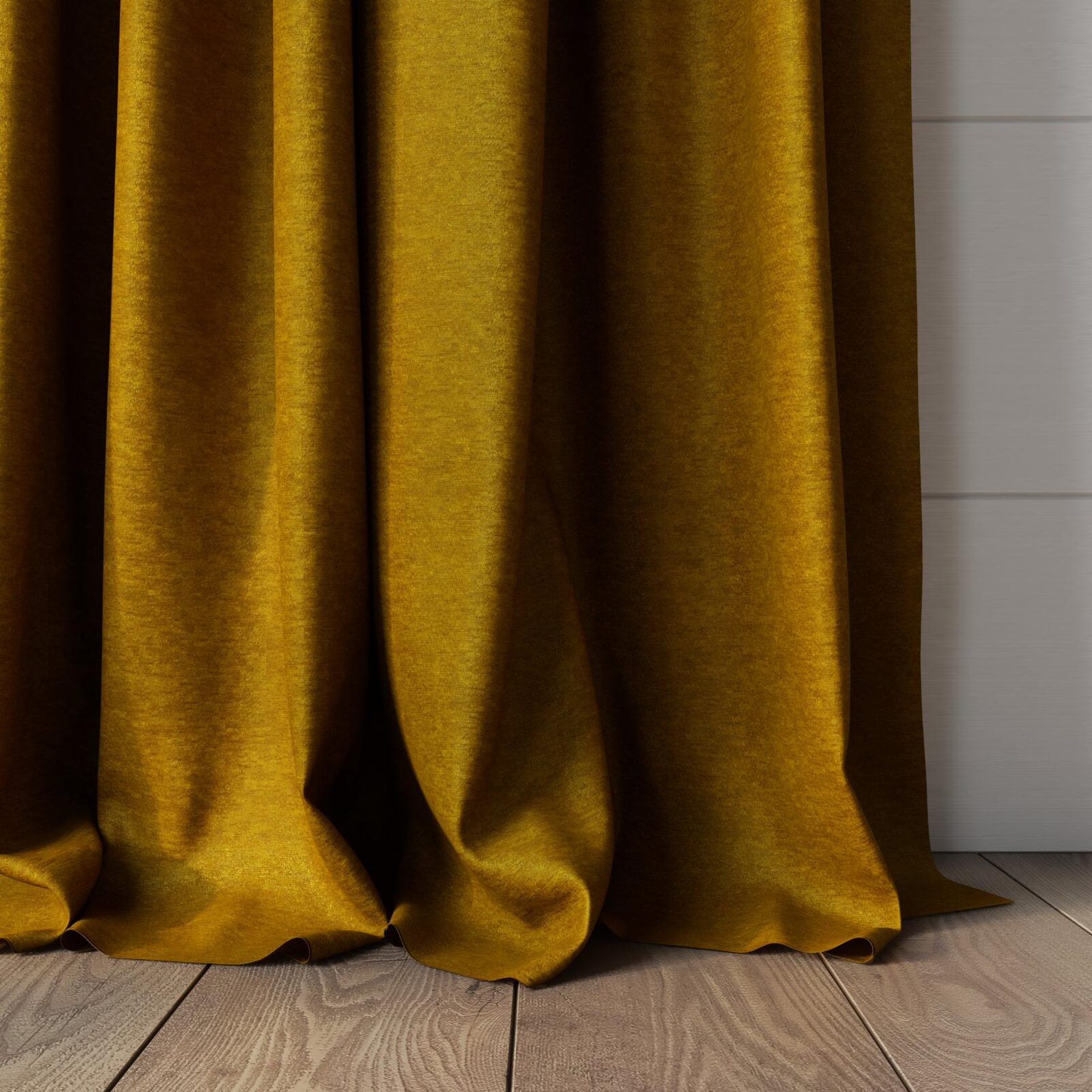 Bottom view of Baron Gold, puddled, on curtain rod