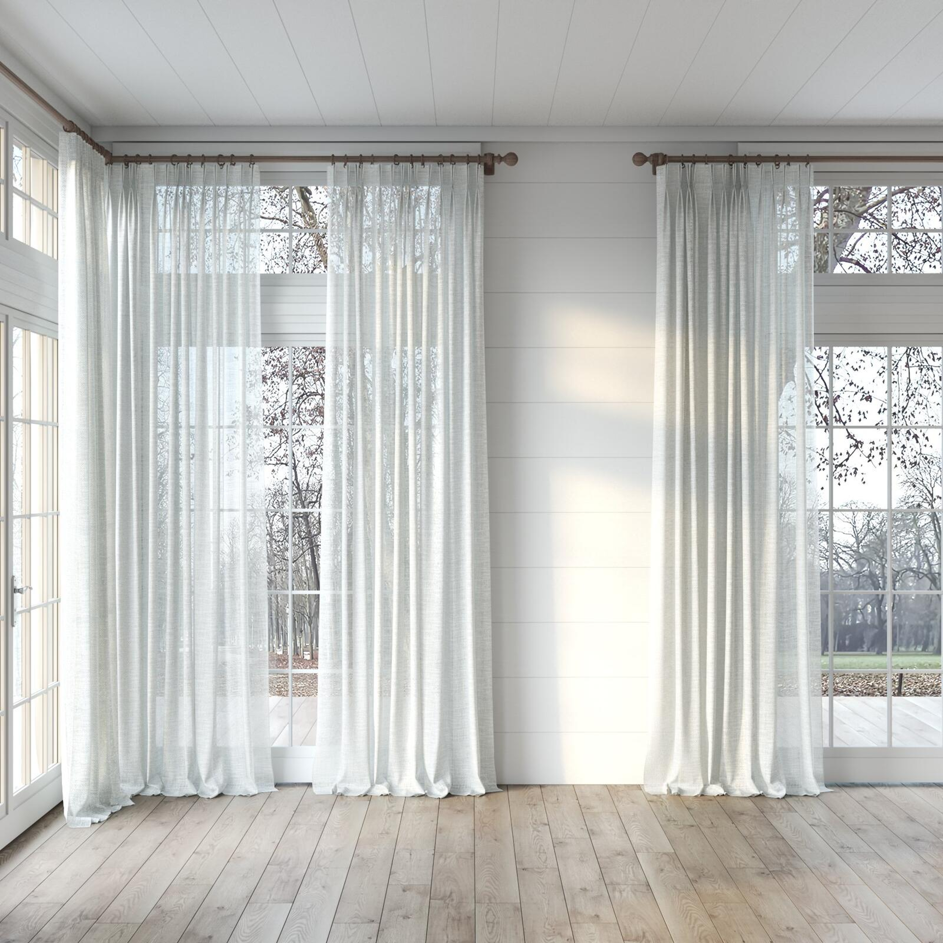 Full view of Threaded Taupe, puddled, on curtain rod