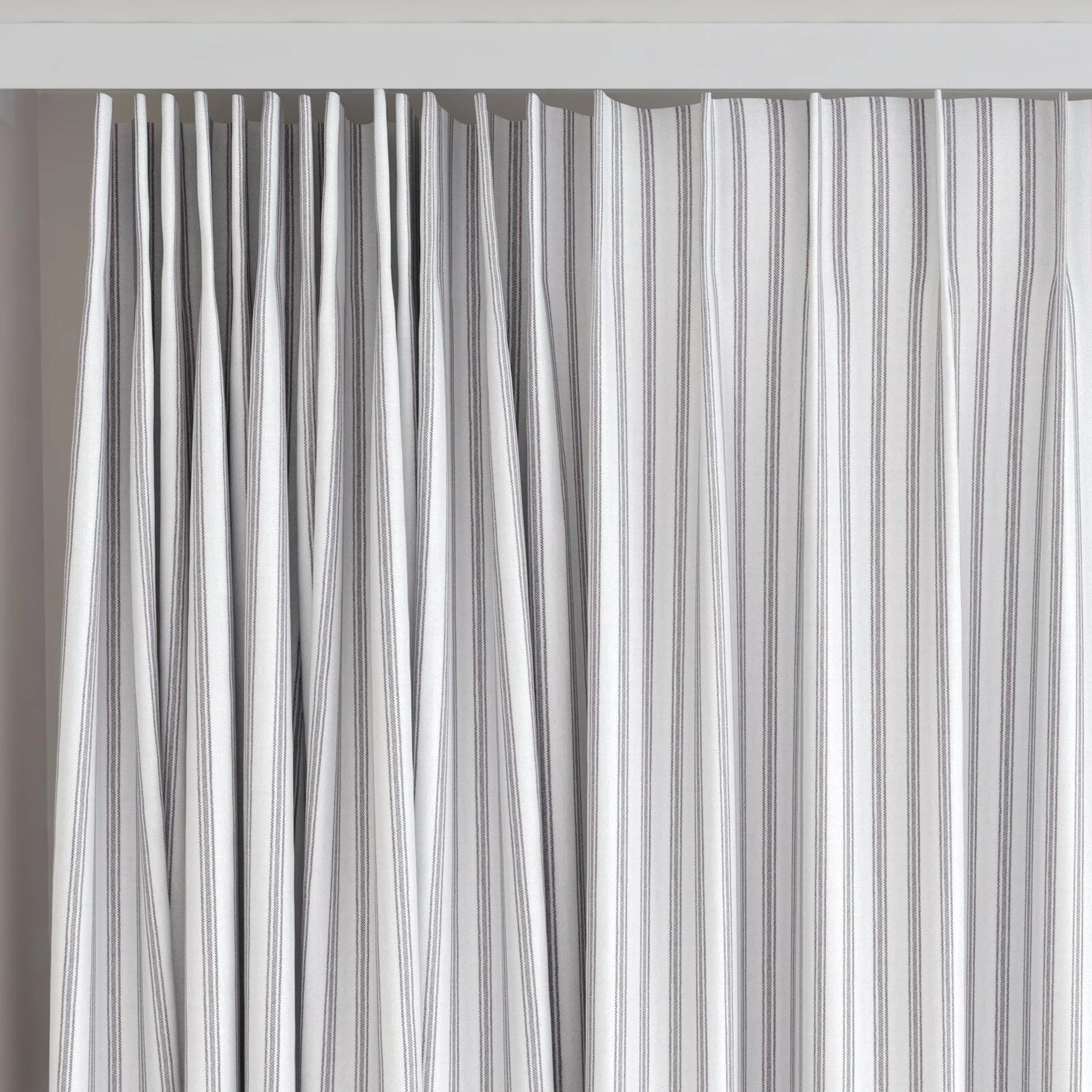 Top view of Chambray Ticking Black, on curtain rail