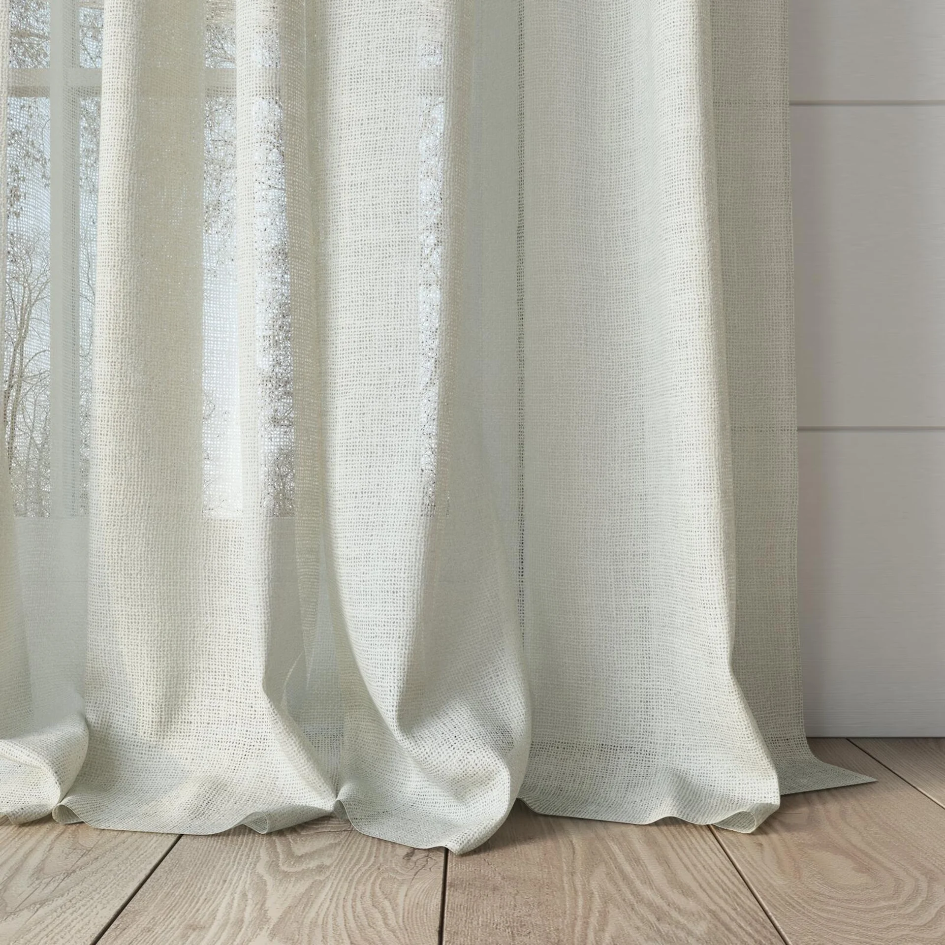 Bottom view of Statement Cream, puddled, on curtain rod