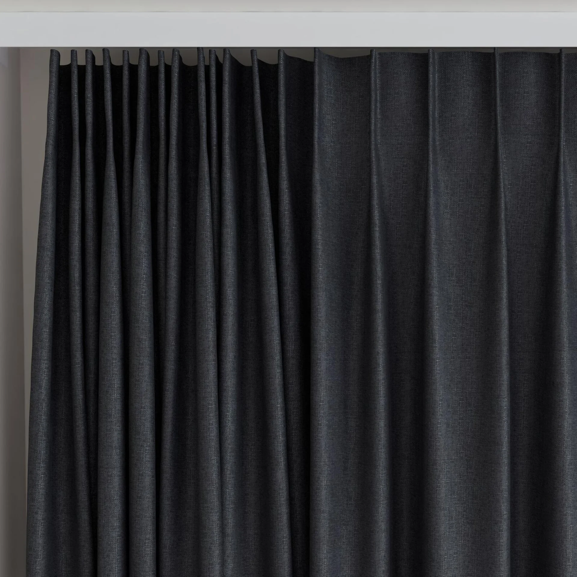 Top view of Retreat Blackout Midnight, on curtain rail
