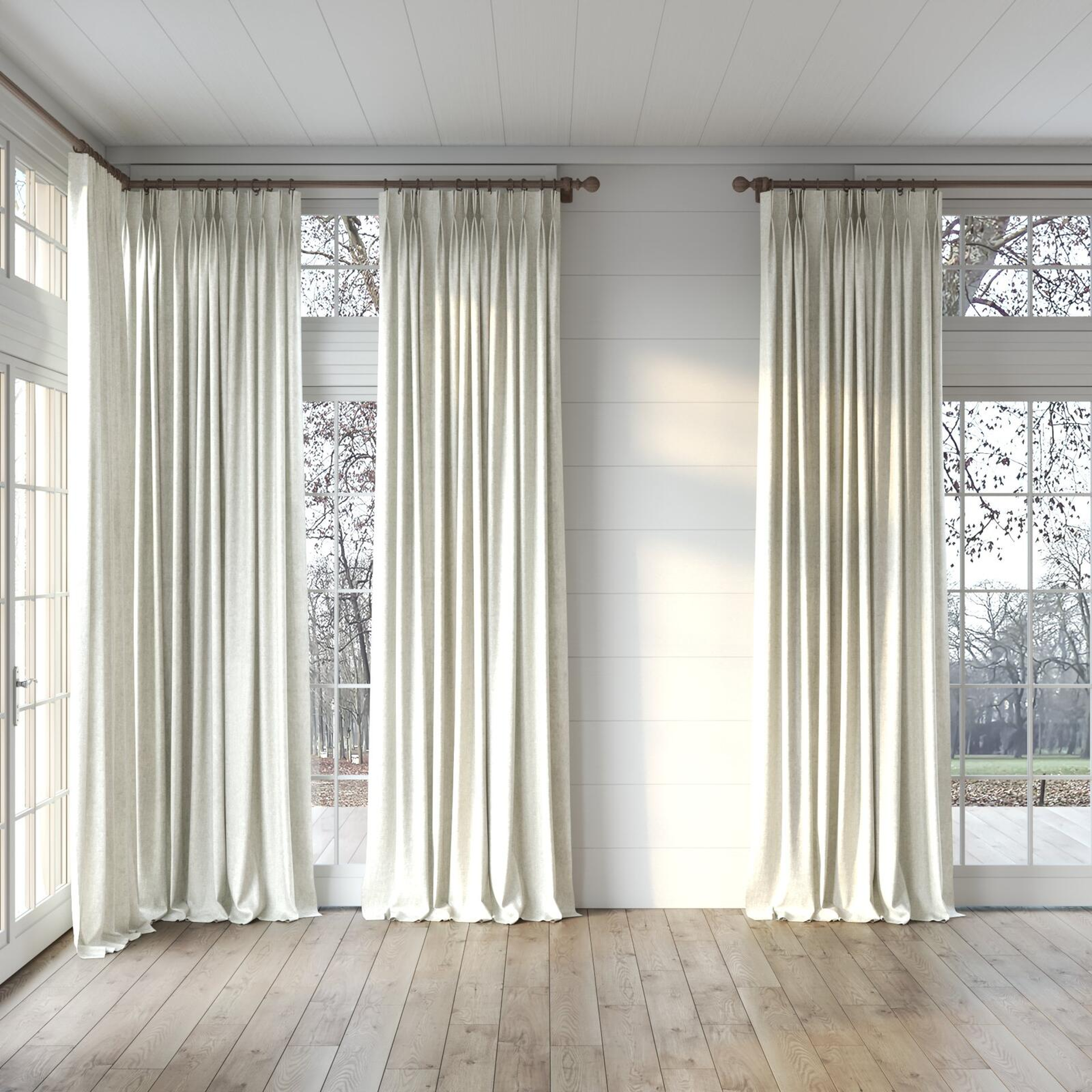 Full view of Hug Cream, puddled, on curtain rod