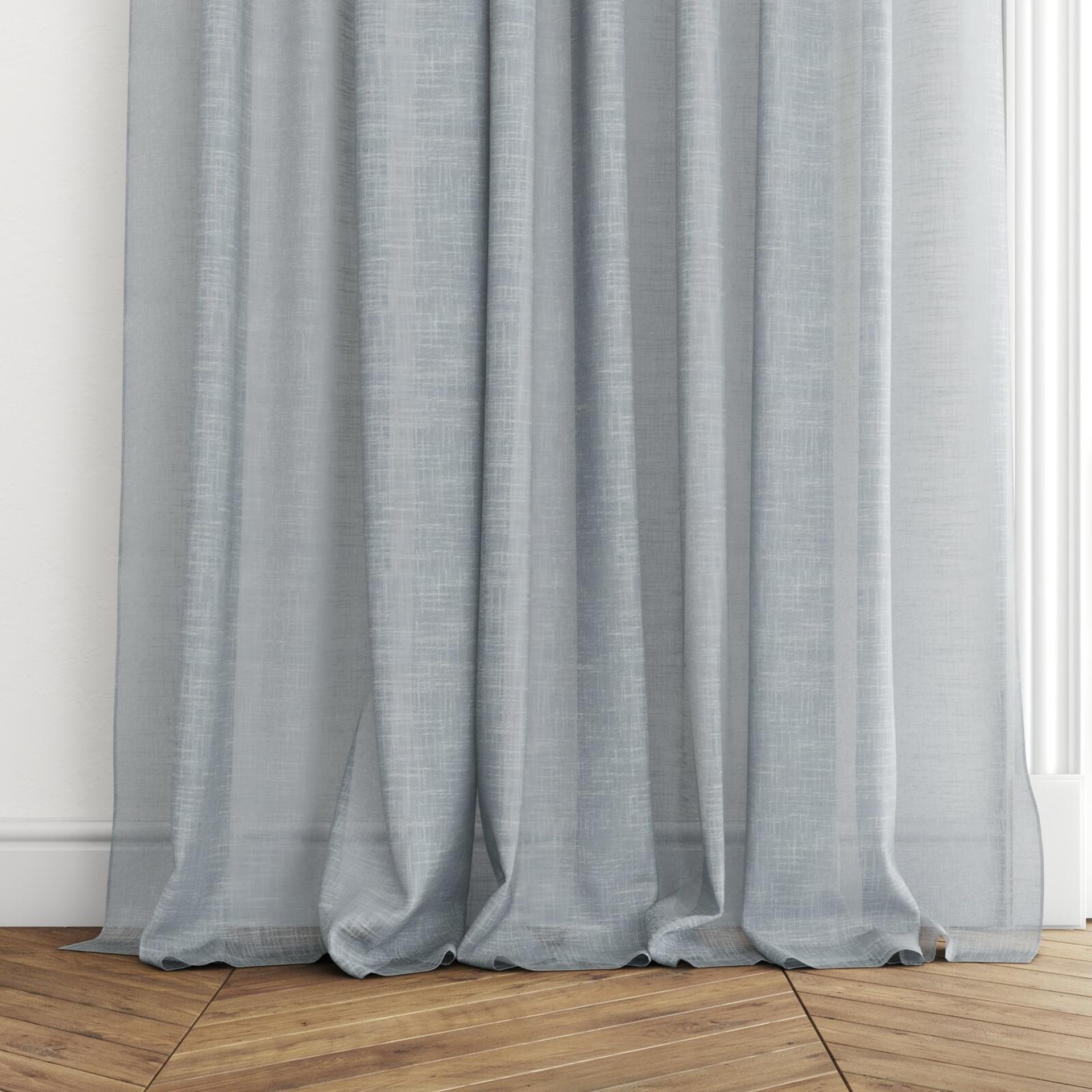 Bottom view of Savina Sky, puddled with pinch pleat, on curtain rod