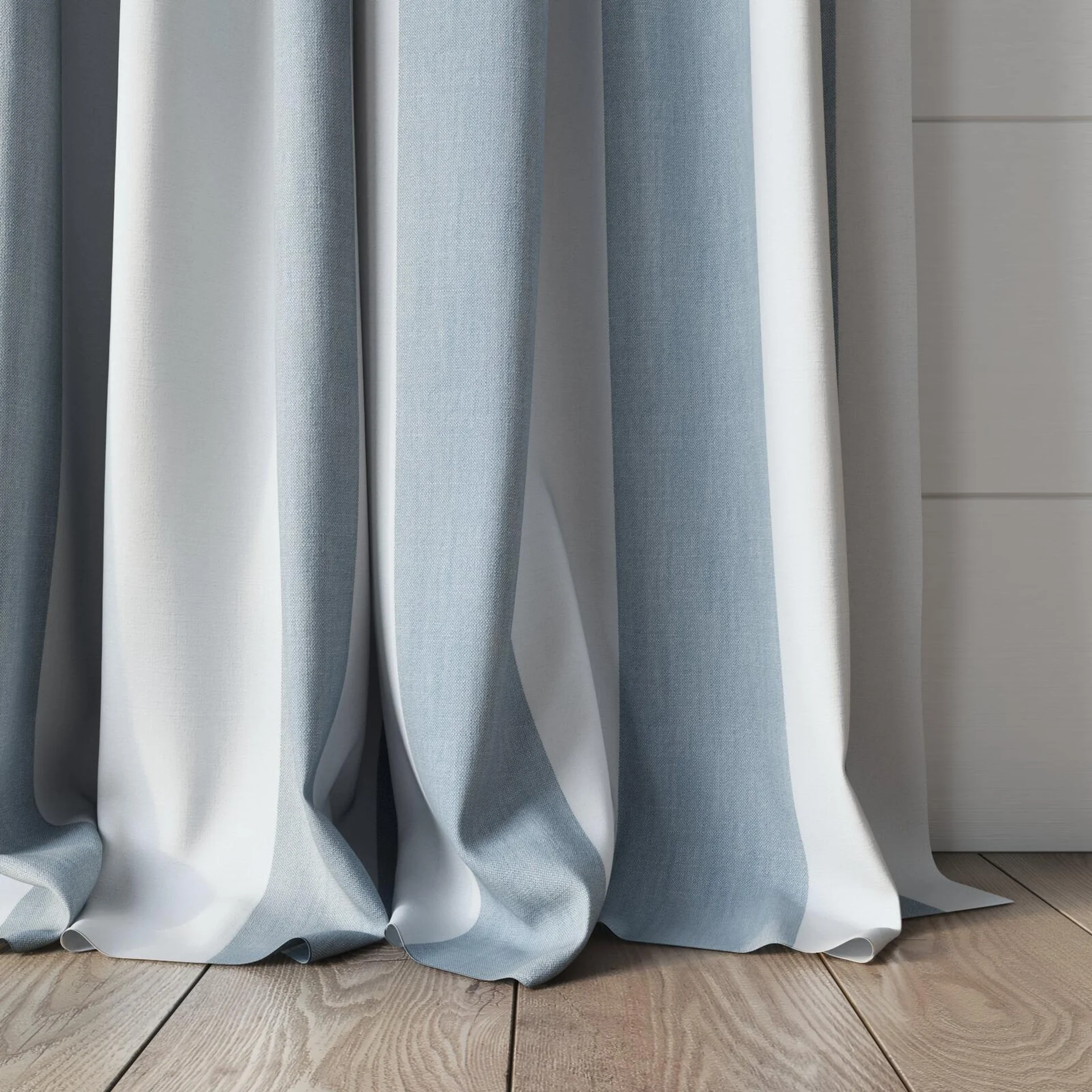 Bottom view of Chambray Bold Sky Blue, puddled, on curtain rod