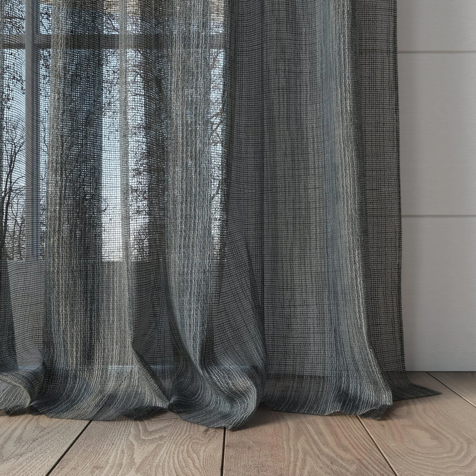 Bottom view of Radiant Charcoal, puddled, on curtain rod