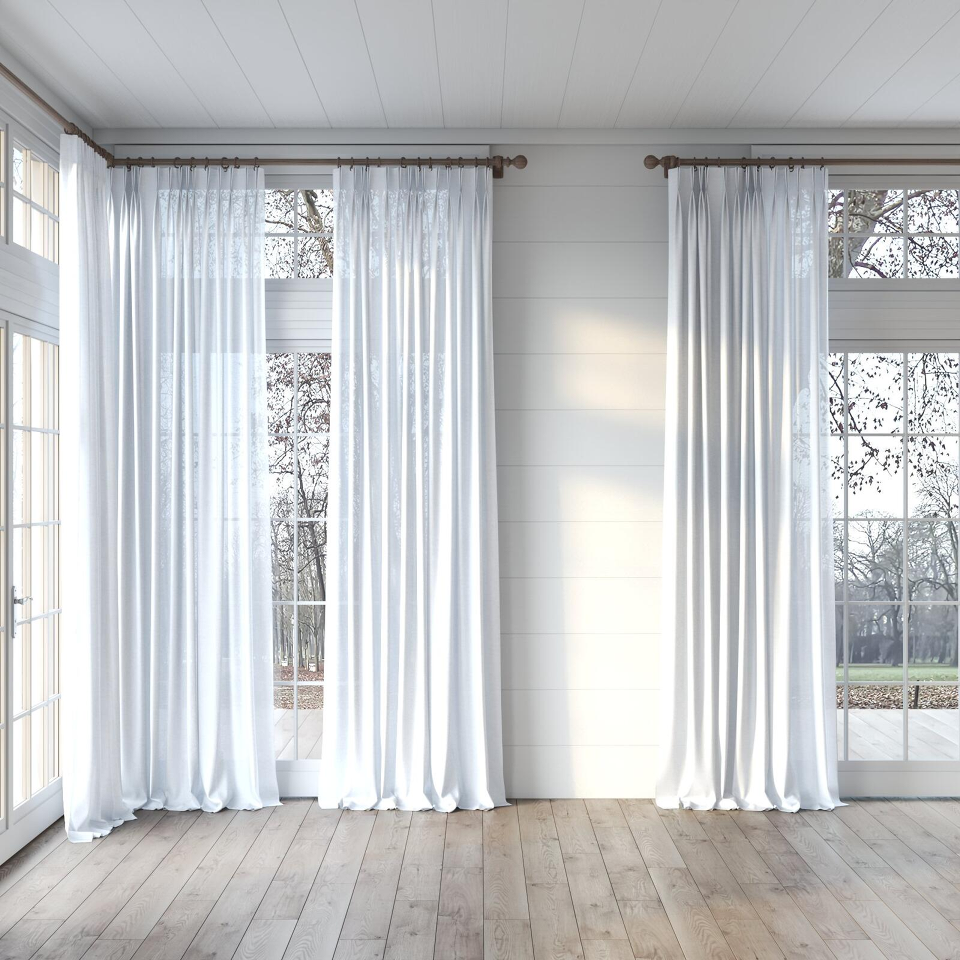 Full view of Arcadia Silver, puddled, on curtain rod