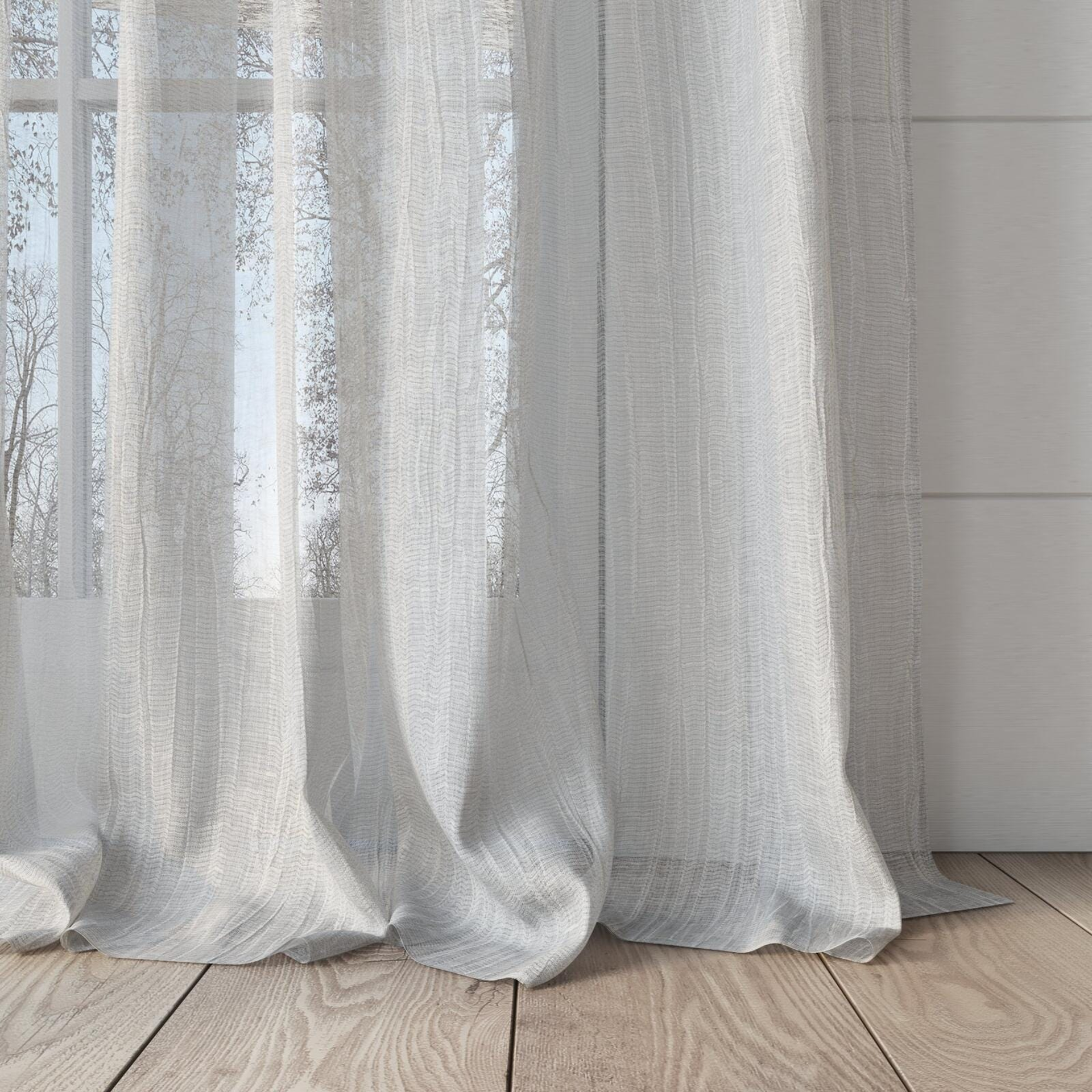 Bottom view of Sonata Cloud, puddled, on curtain rod