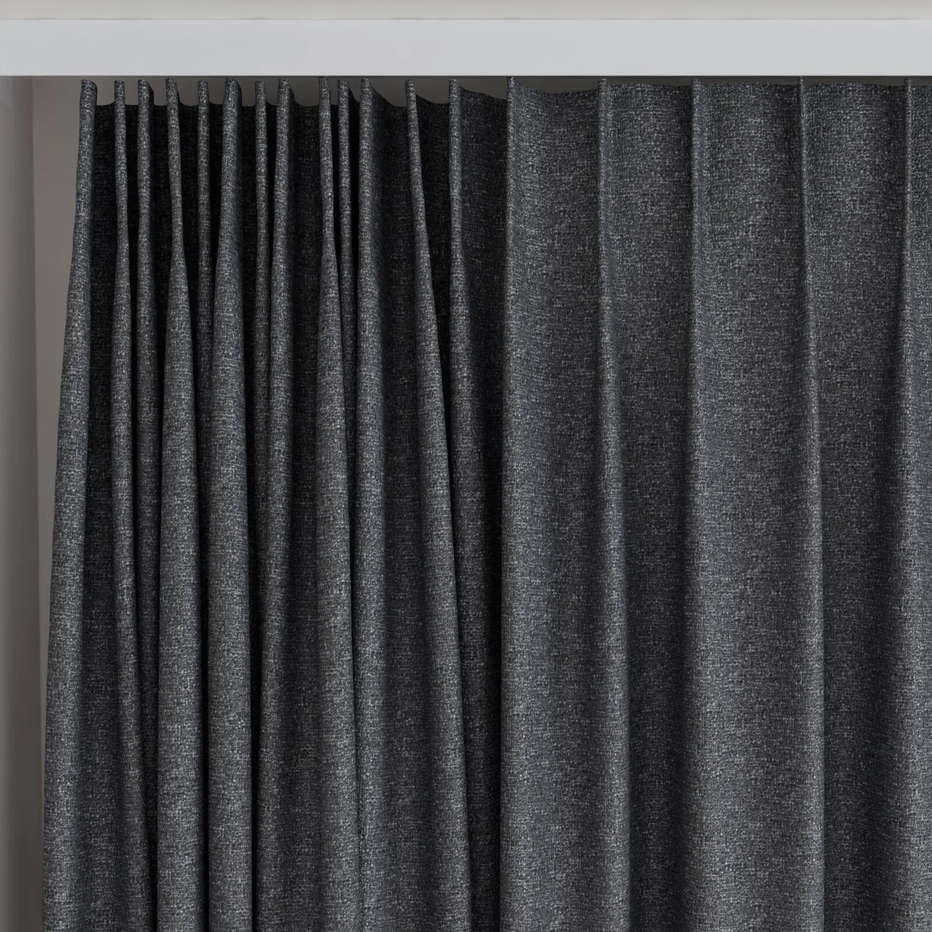 Top view of Bora Bora Charcoal, on curtain rail