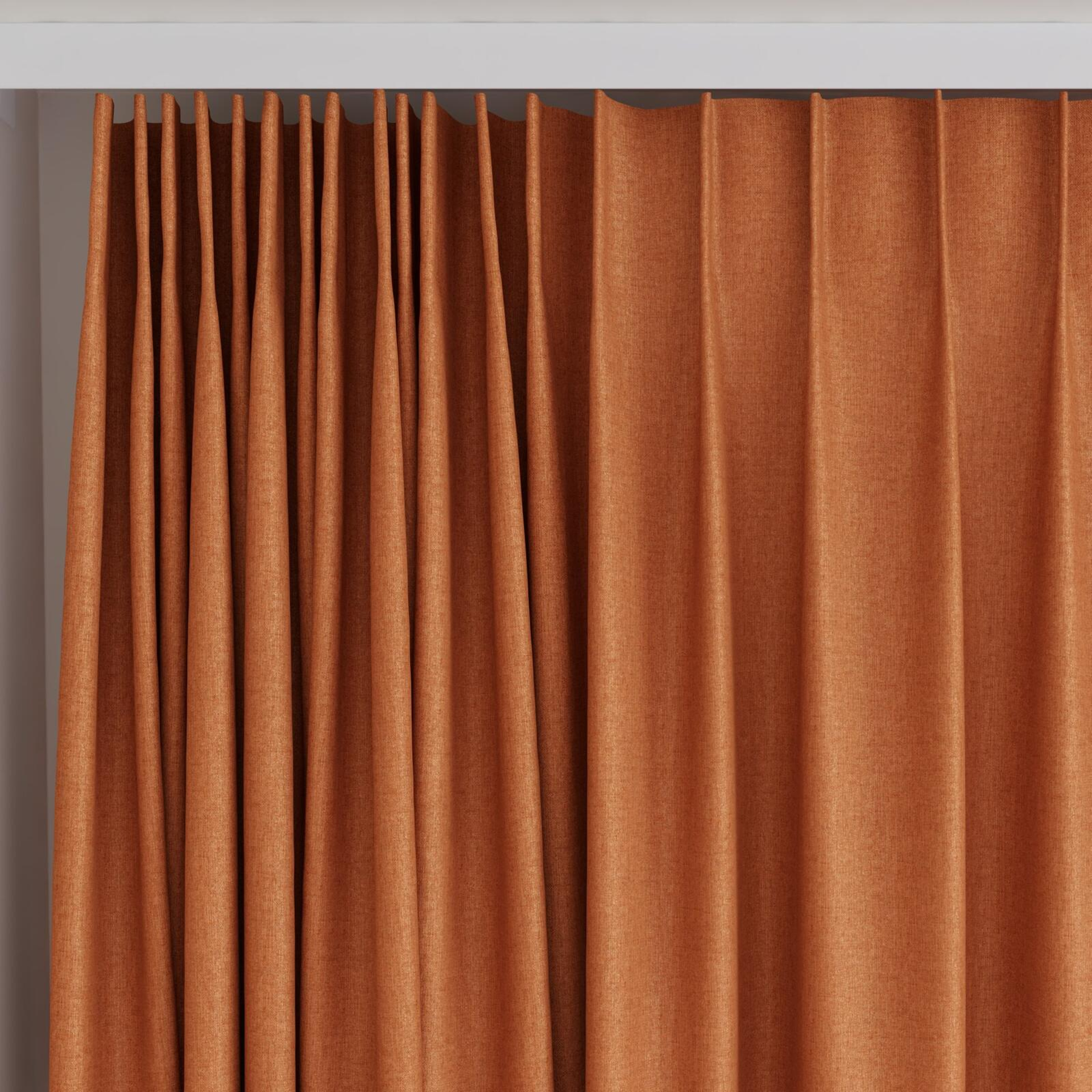 Top view of Cushy Ginger, on curtain rail